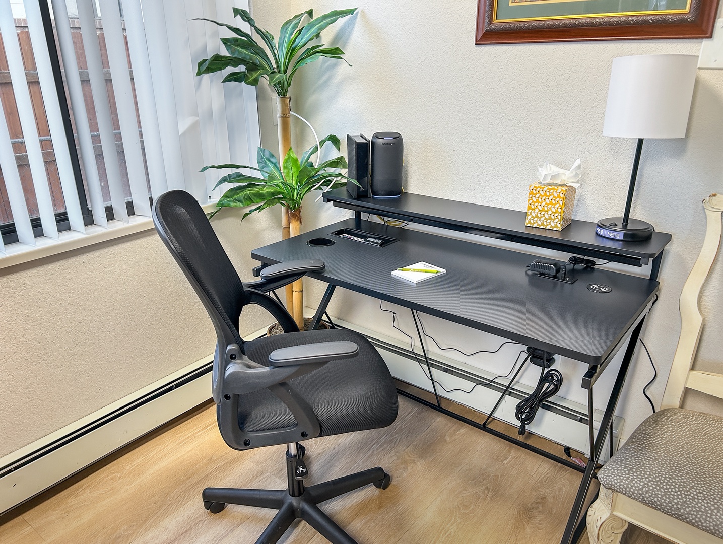 Your dedicated workspace awaits with ergonomic seating, modern desk setup, and natural light to keep you productive during your stay.