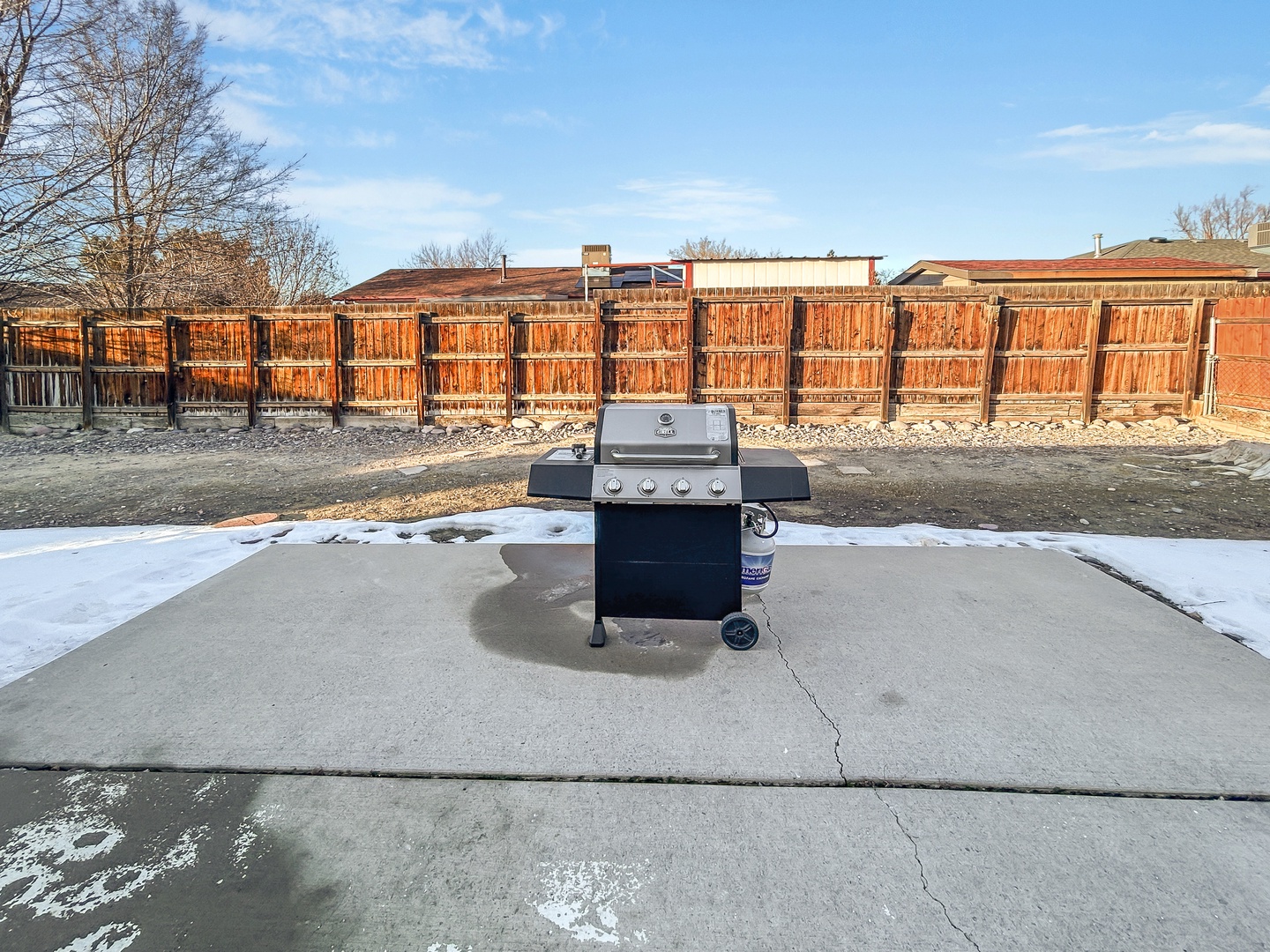 Fire up your culinary skills on this premium gas grill in your private outdoor space, perfect for memorable meals.