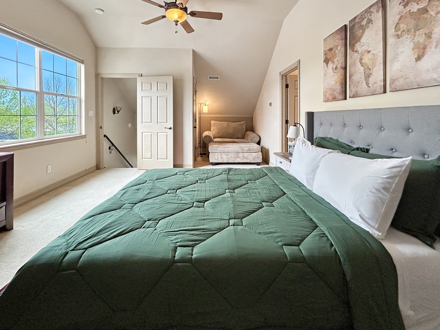 Sink into your cozy retreat with plush bedding and a cozy reading nook area.