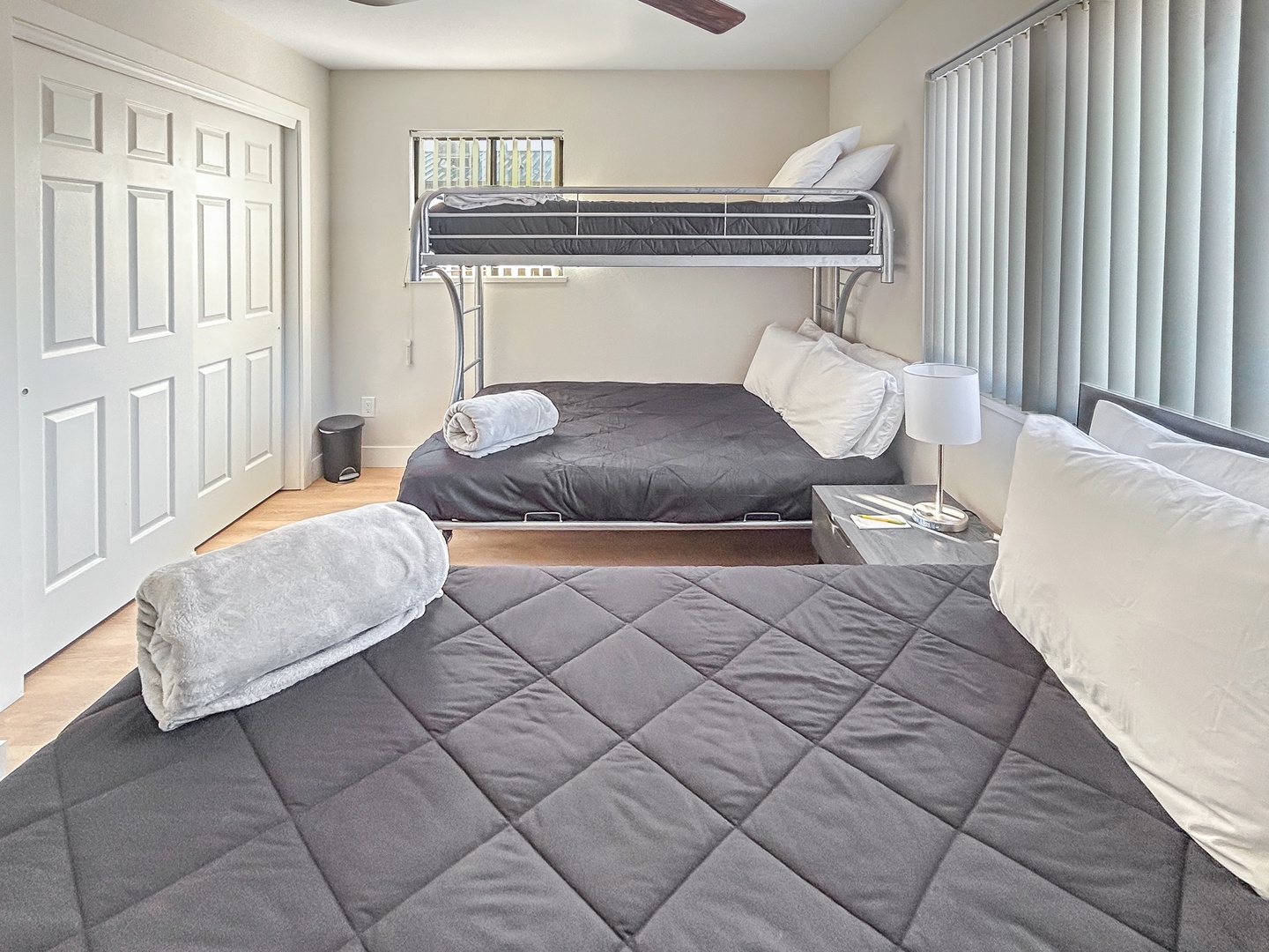 Your group's perfect sleep setup with comfortable bunk beds and twin bed.