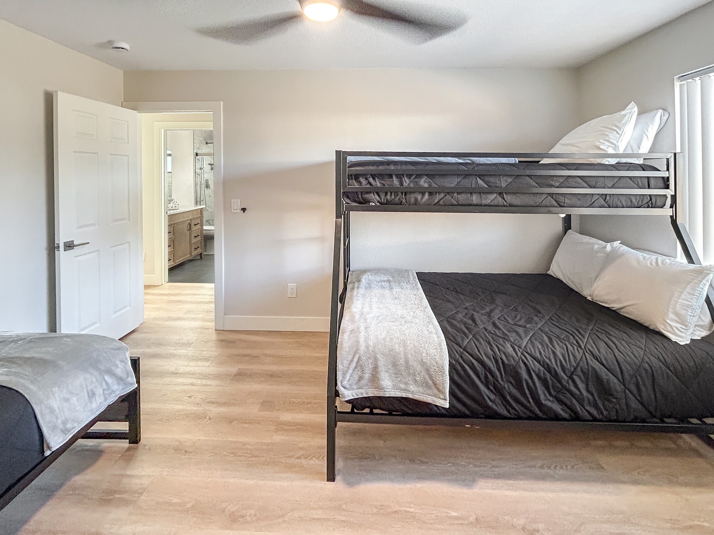 Your family will love this spacious bunk room with plush bedding.