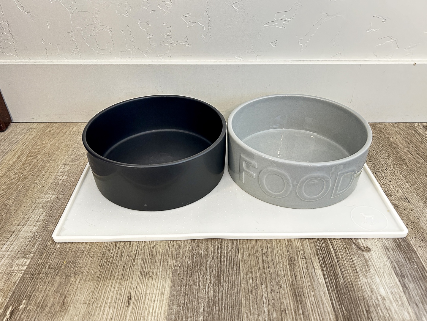 Your furry friend will feel right at home with these stylish feeding bowls set up and ready for mealtime.