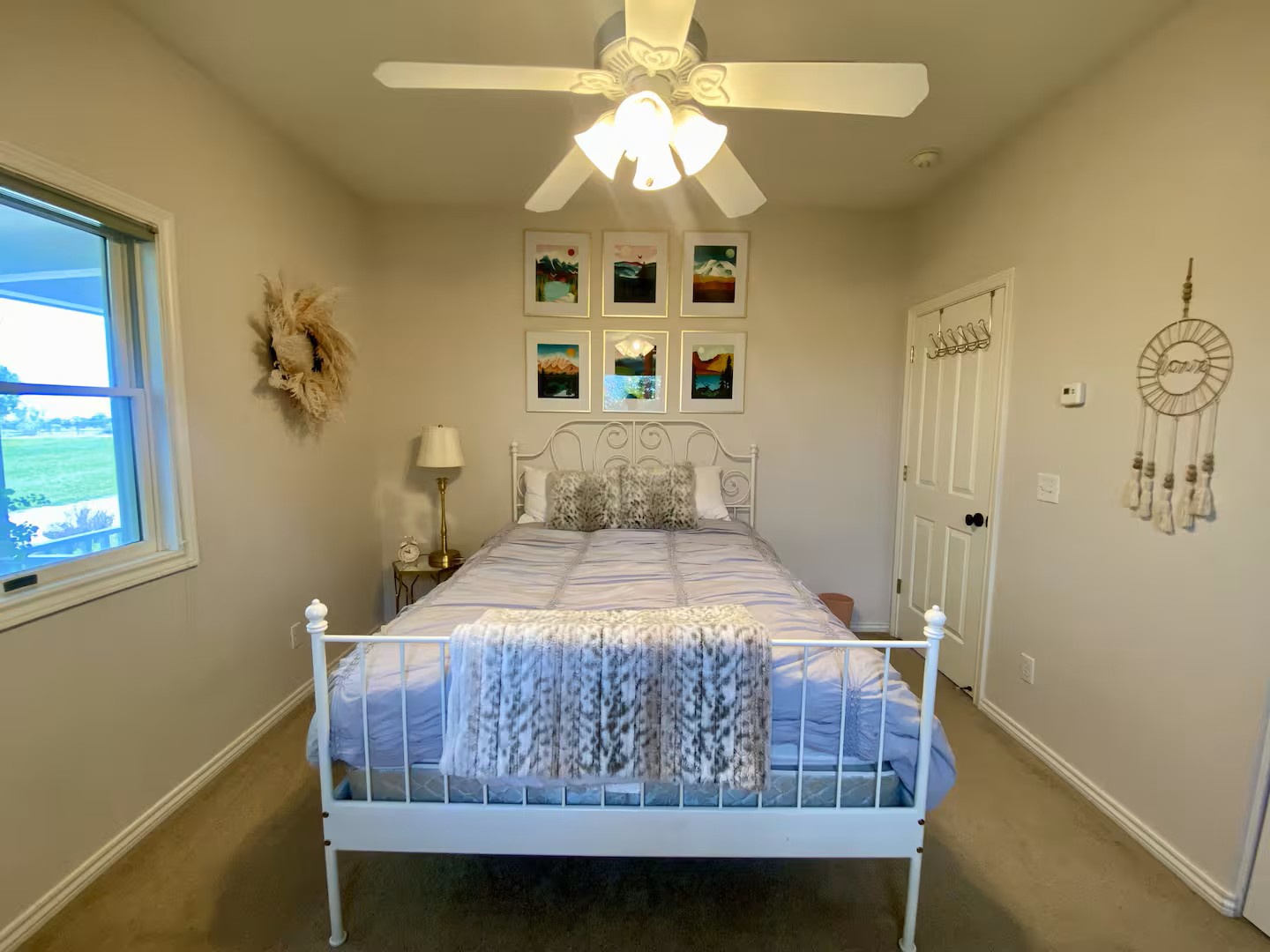 Relax in your charming bedroom with countryside views, cozy linens, and rustic-chic decor.