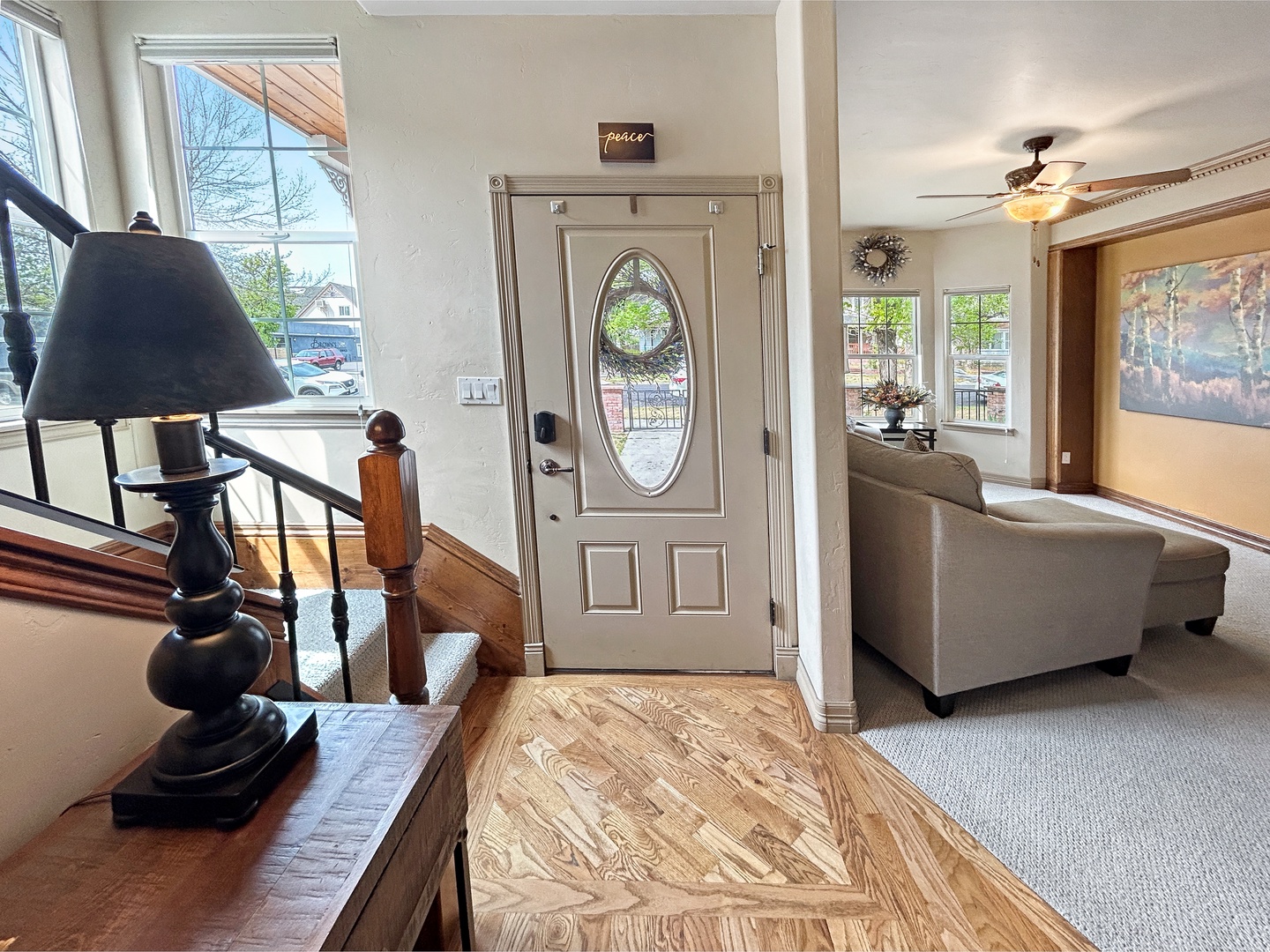 Step into your welcoming entrance where rich hardwood floors and elegant furnishings create a warm first impression for your getaway.