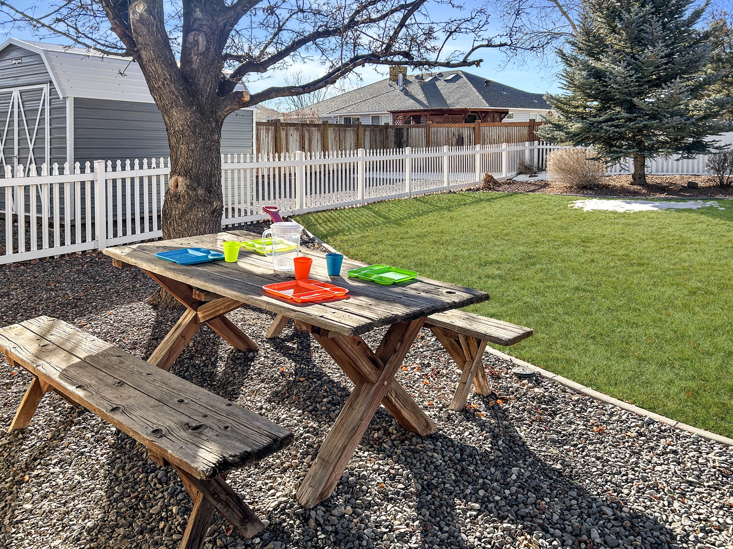 Your family and pets will love this sunny fenced backyard space.