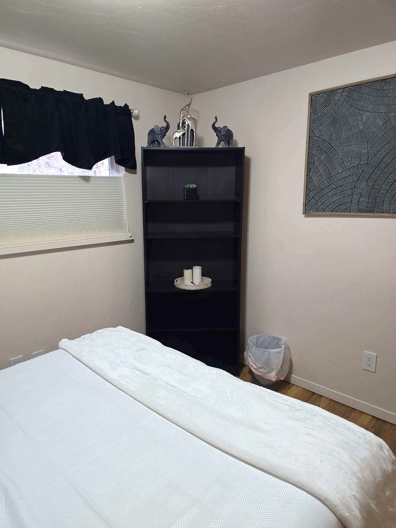 Relax in your thoughtfully decorated bedroom featuring charming elephants