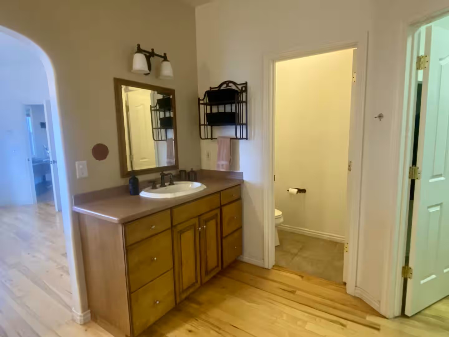Your private bathroom features plenty of counter space with two separate vanities and private toilet room.