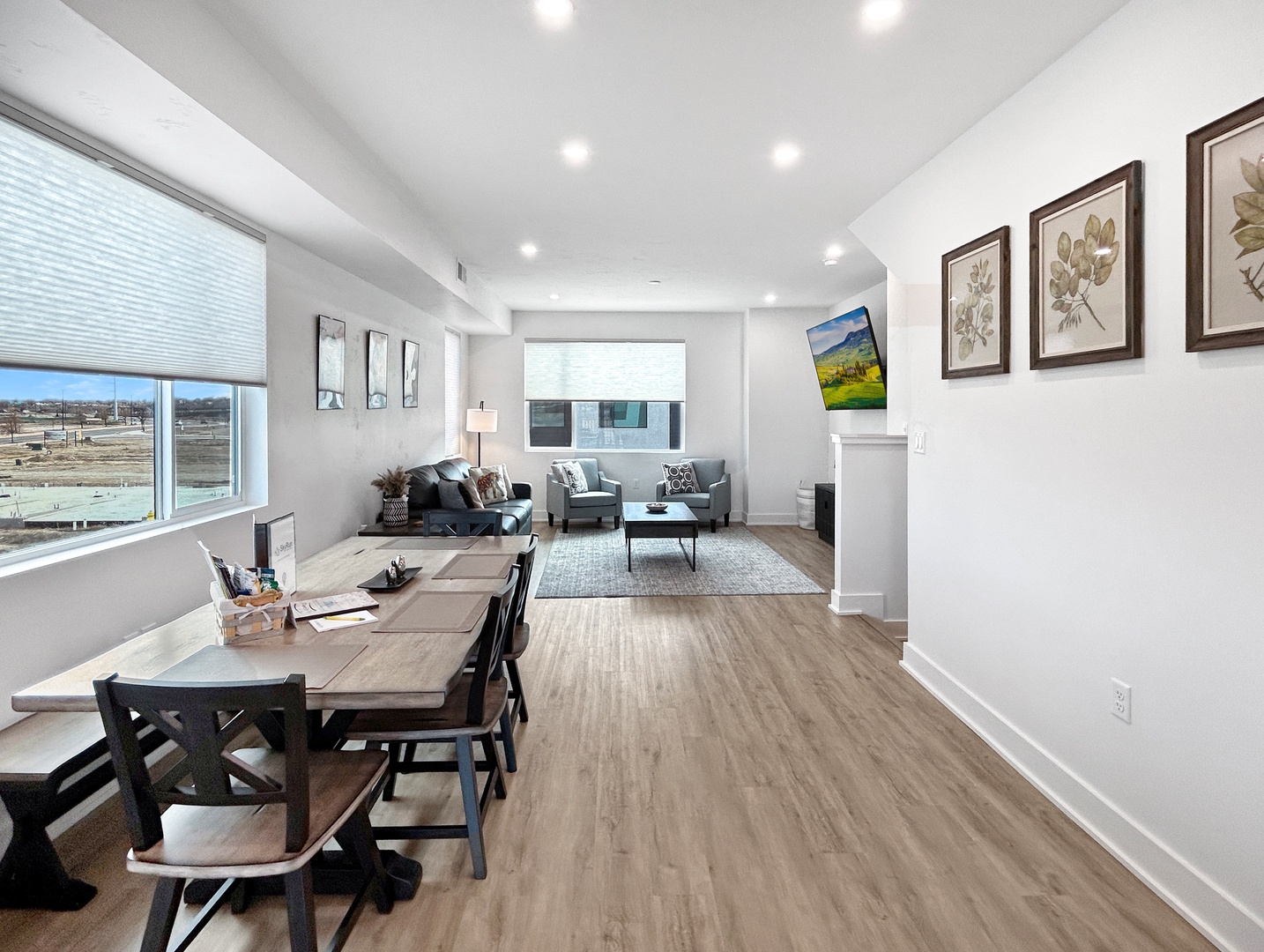 Relax in your open-concept living space where modern comfort meets style, featuring natural light and thoughtful details for your perfect getaway.