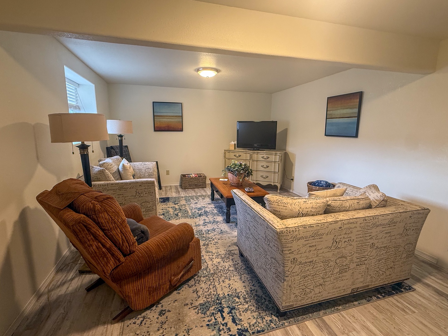 Settle into this cozy living after a day of exploring