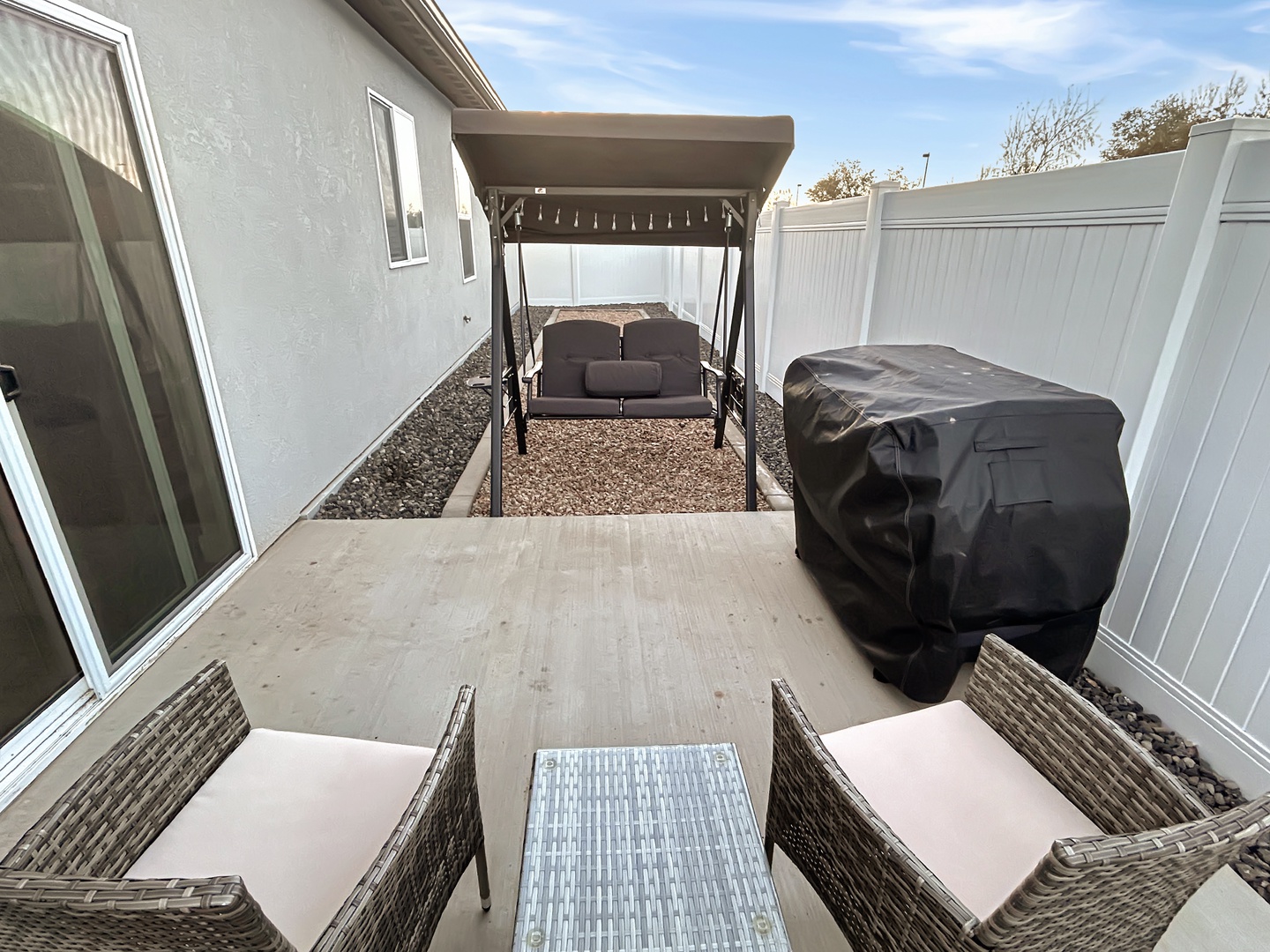 Your private patio with swing and flat-top grill