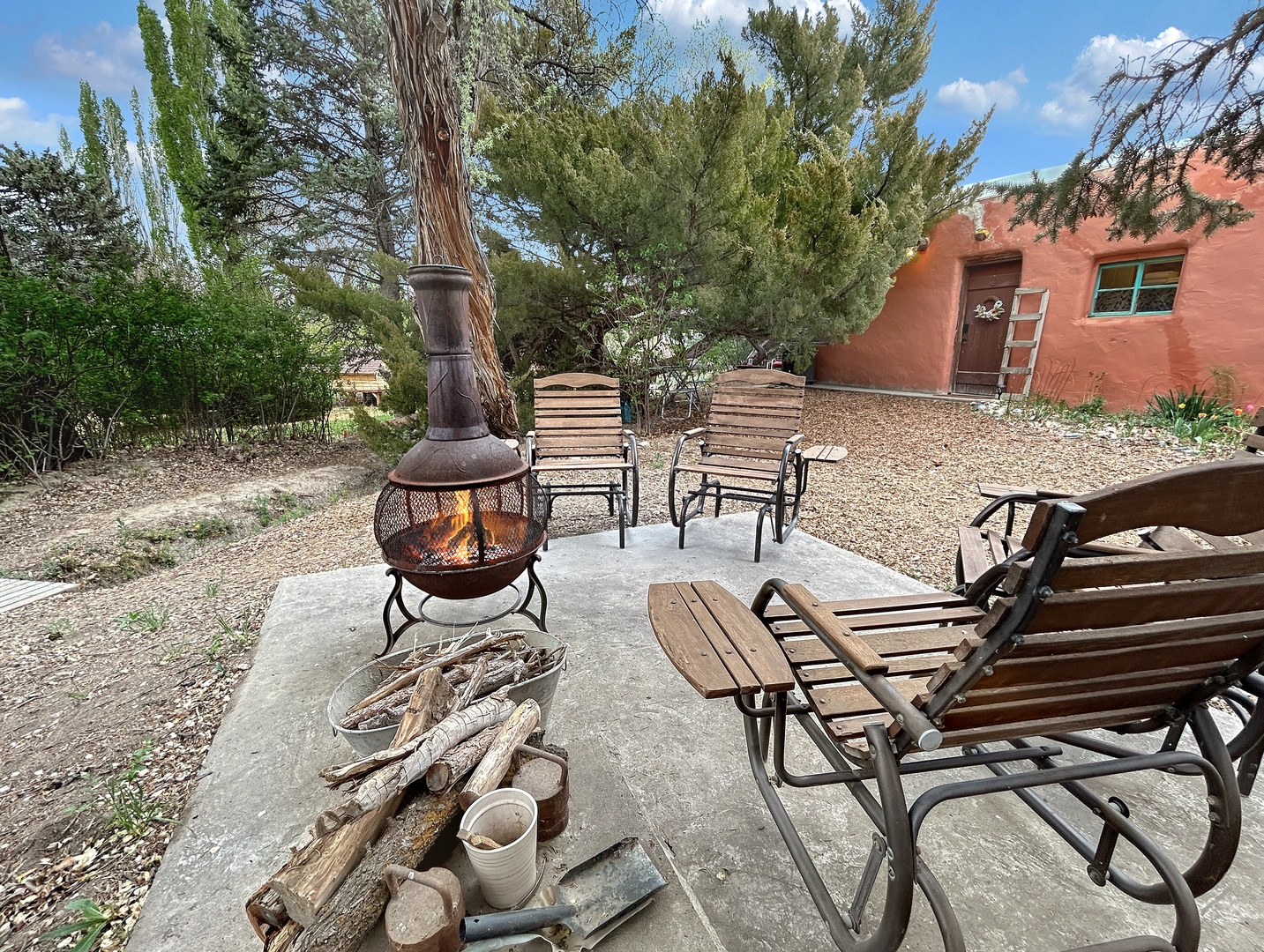 Gather around your private fire pit for evening stargazing, with comfortable seating perfectly arranged for desert relaxation.