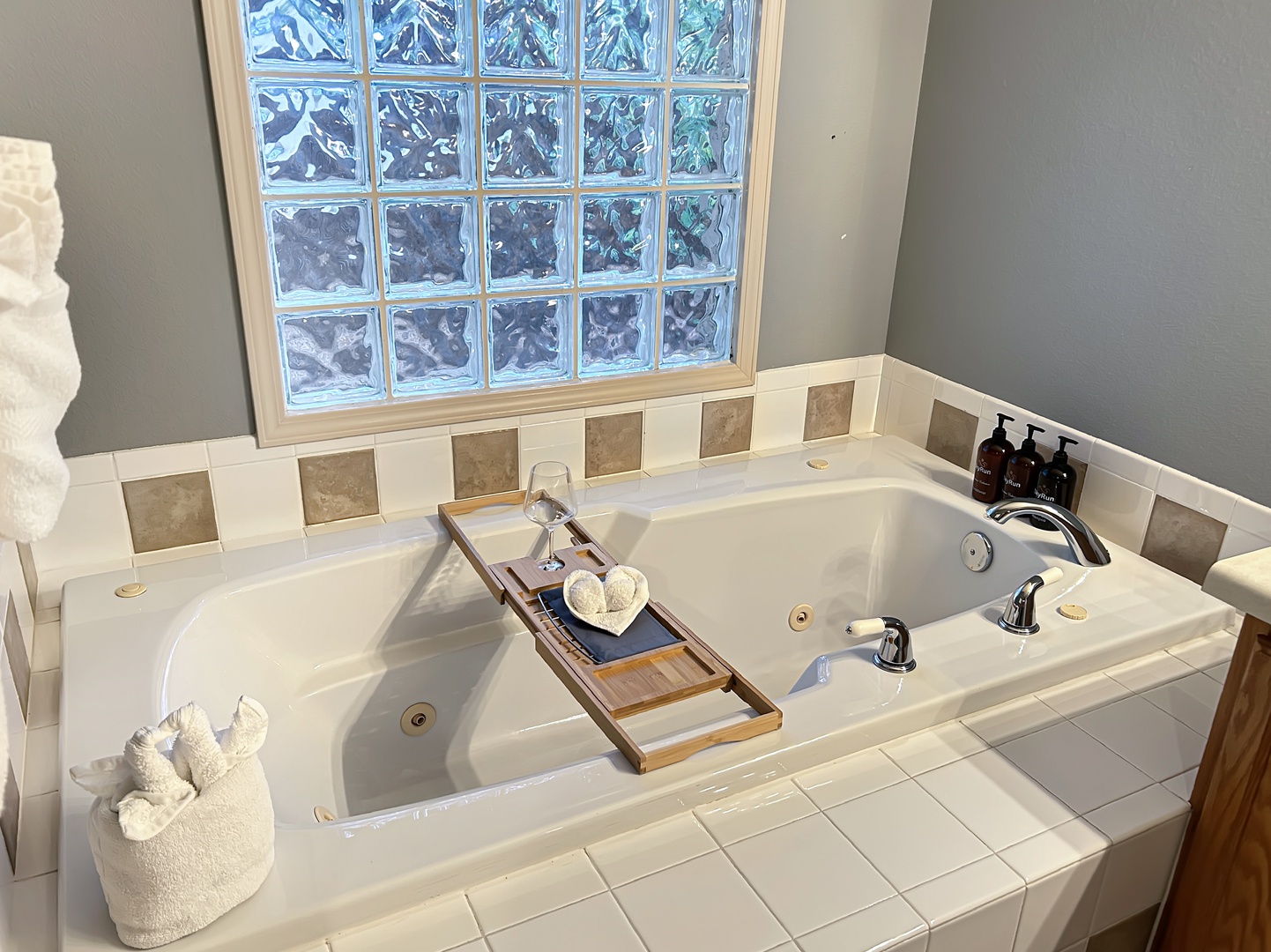 Unwind in your private jetted tub with spa amenities and soft towels for the ultimate relaxation experience.