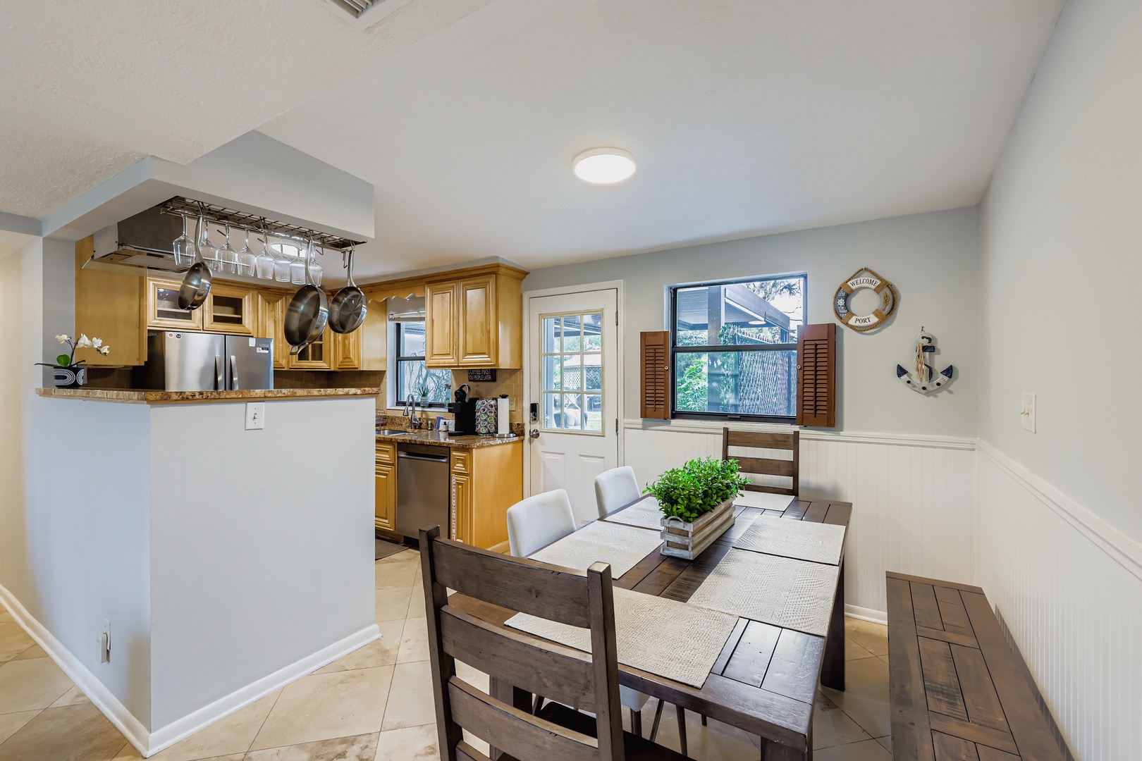 Welcoming kitchen, seaside style dining