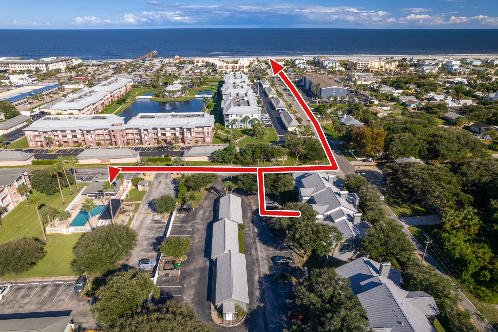 Easy walk from your door to the pool and beach, just follow the red arrows