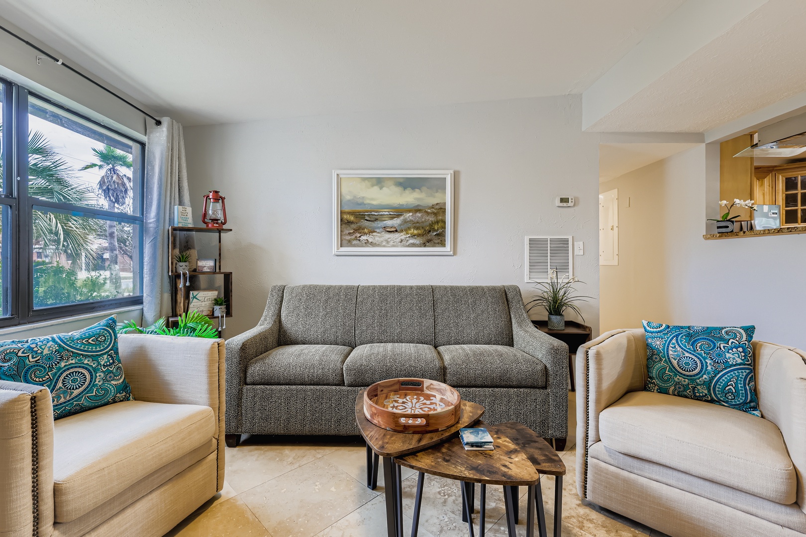 Plush seating and tropical views.