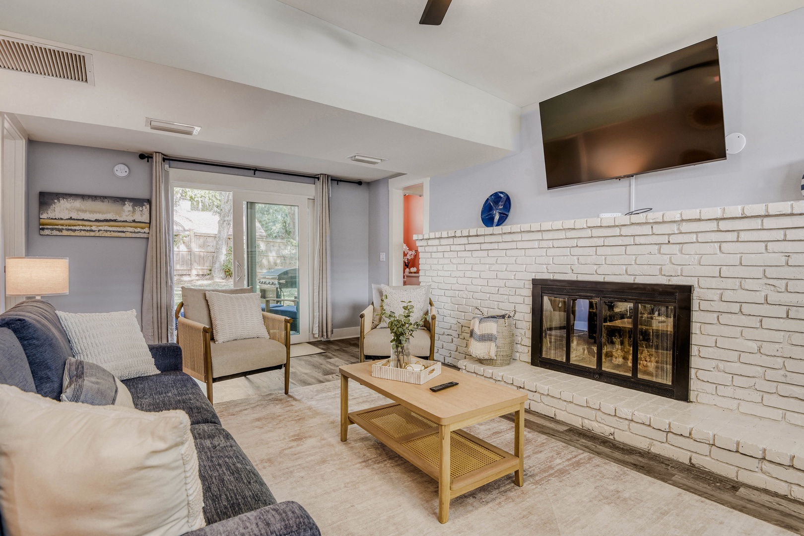 Modern furnishings, and large TV for perfect evenings