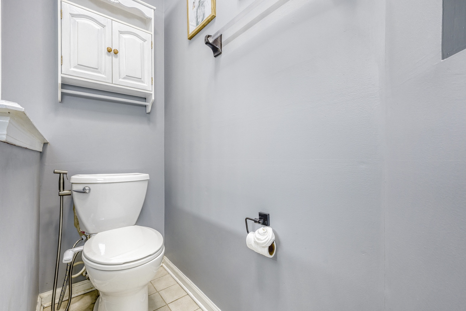 Cozy updated bathroom handheld bidet