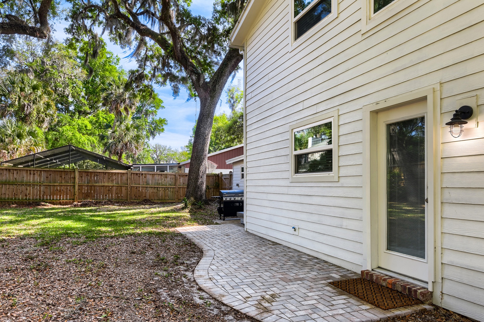 Your private brick pathway to backyard oasis