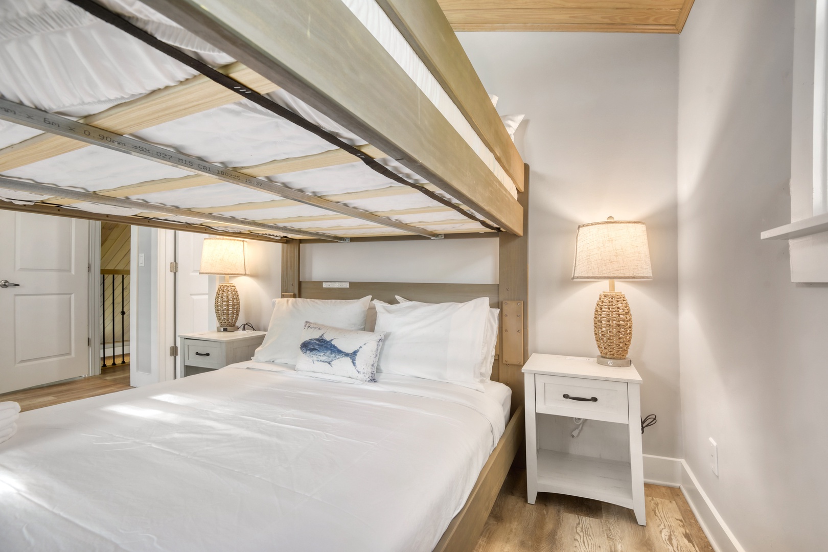 Cozy Queen Bunk Beds Under Wood Ceilings