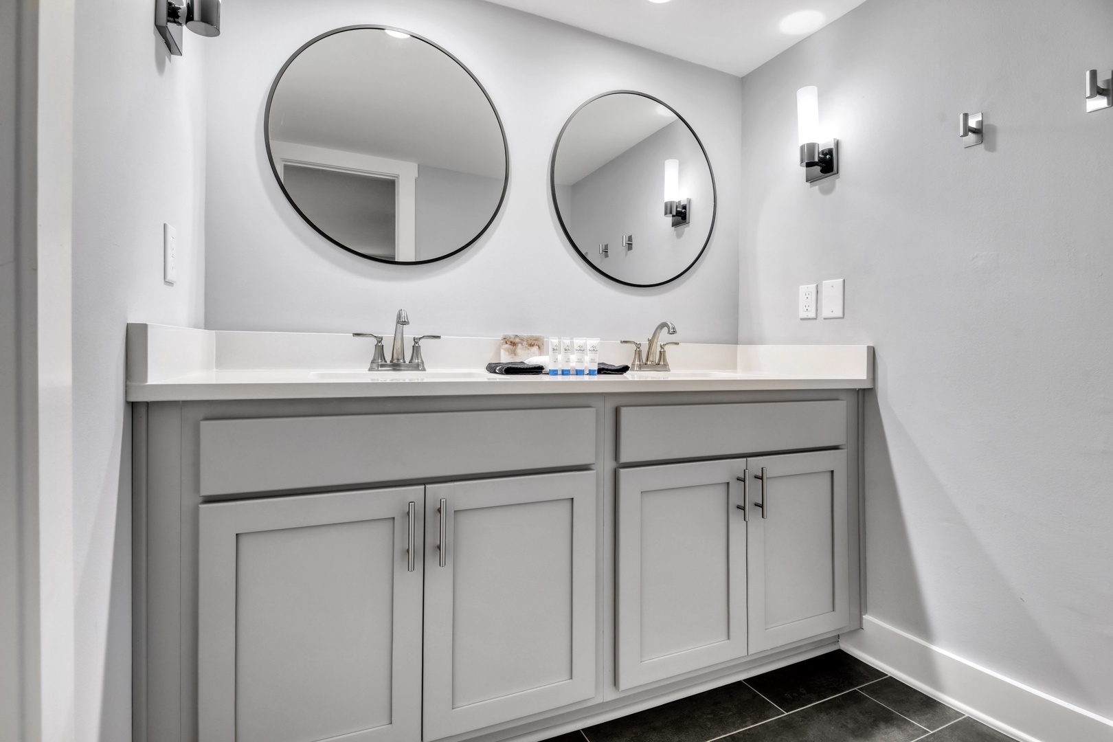 Elegant Dual Sink Bathroom with Sleek Mirrors