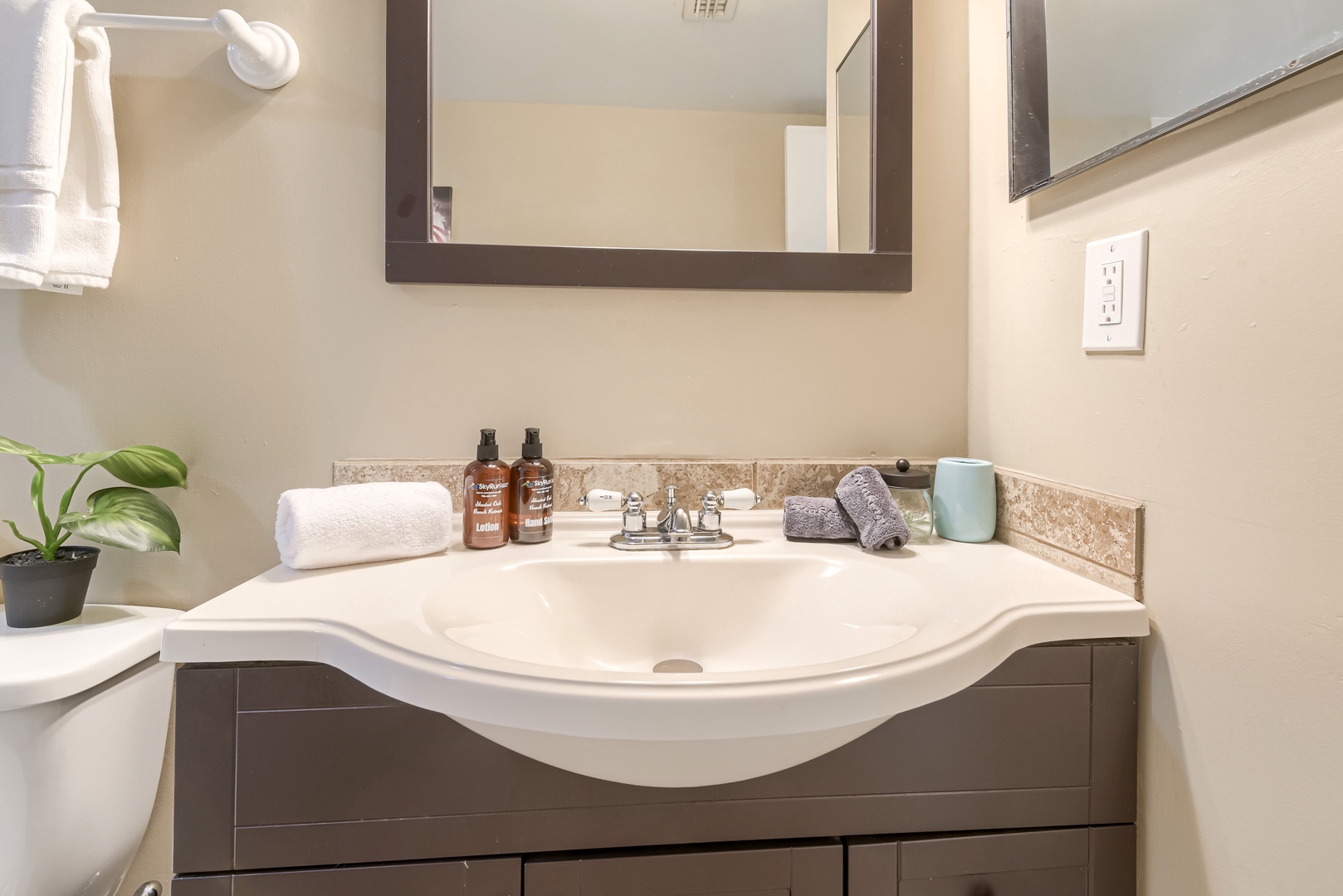 Clean, simple vanity with a wide sink and plenty of counter space
