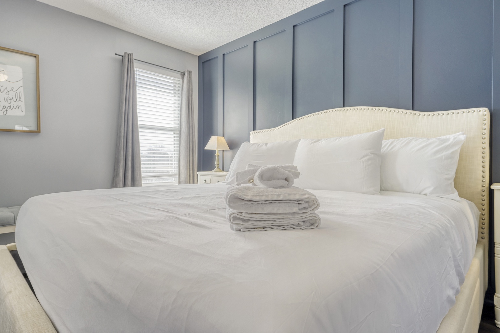 Sink into crisp white linens and plush pillows.