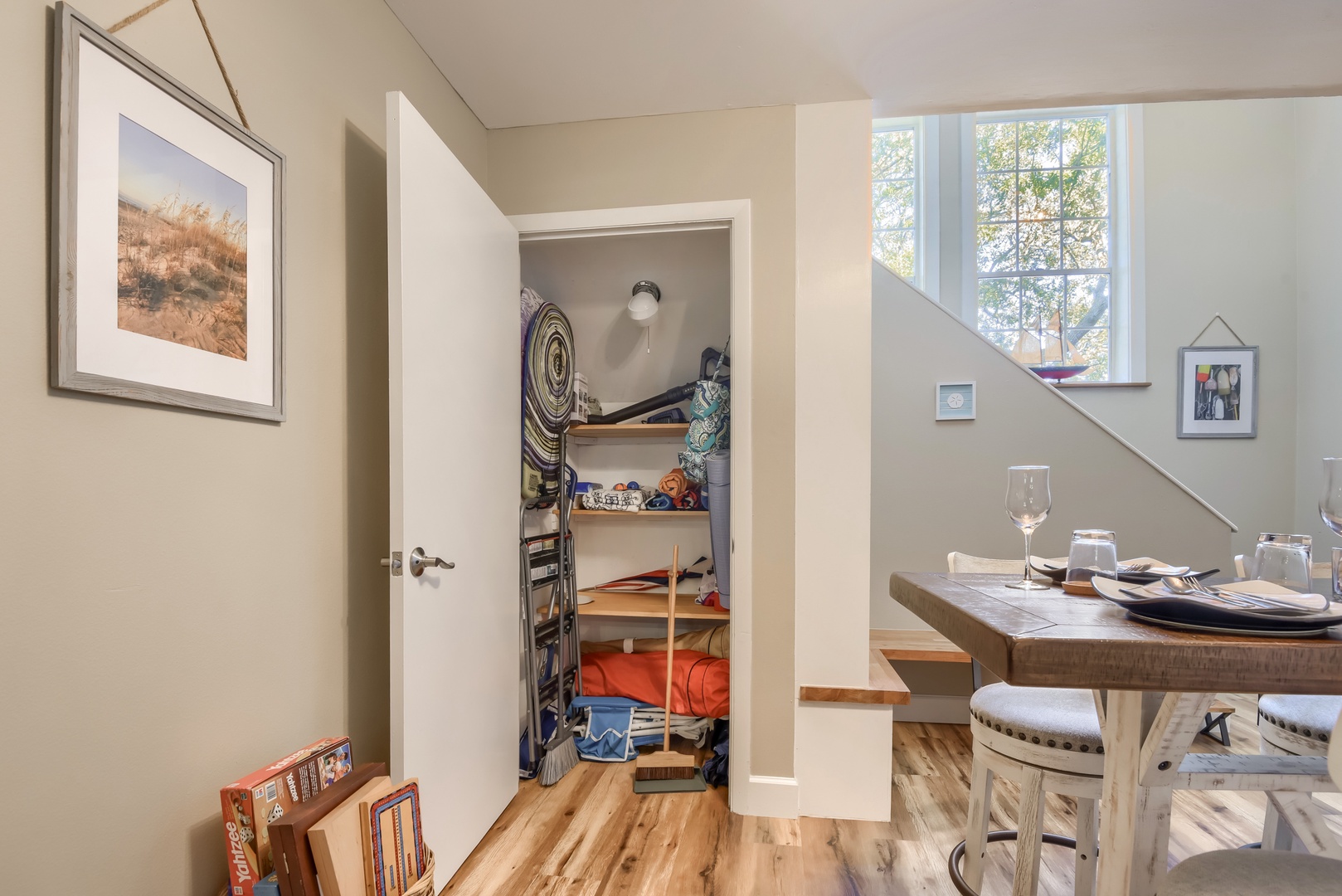 Handy storage closet with beach gear, plus board games for family nights