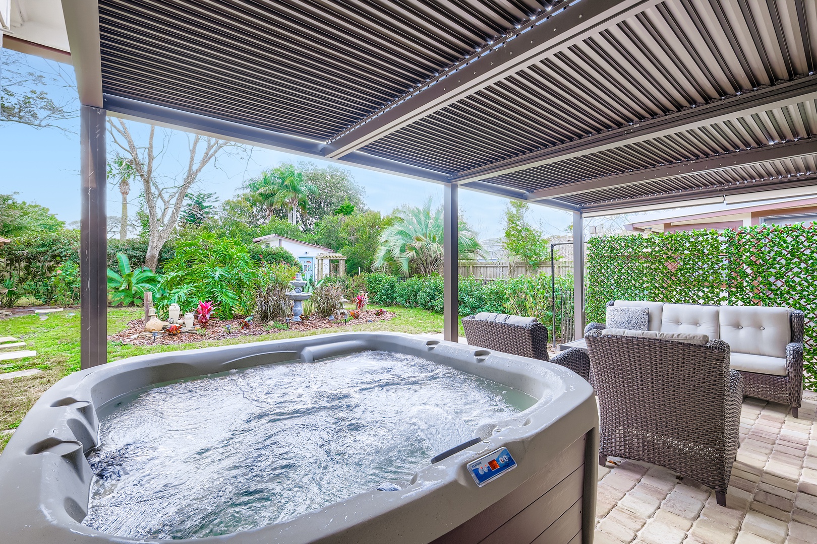 Luxe hot tub under covered patio