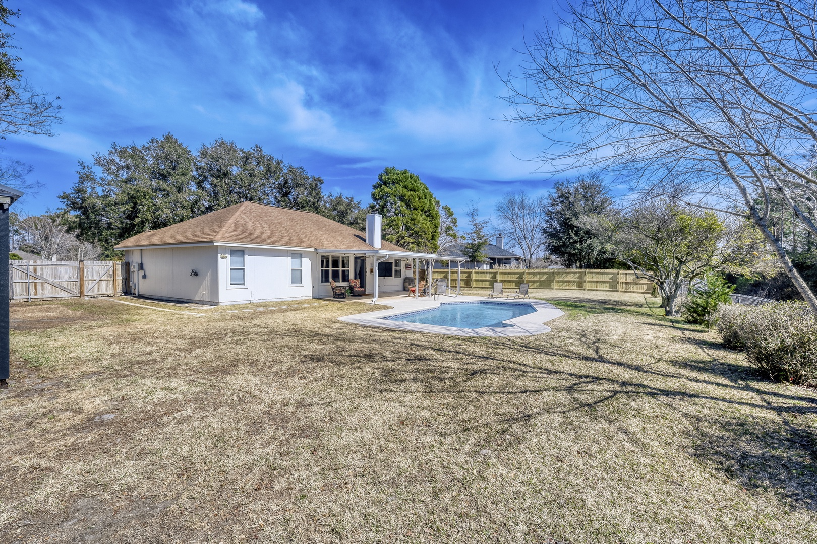 Sunny backyard pool perfect relaxation