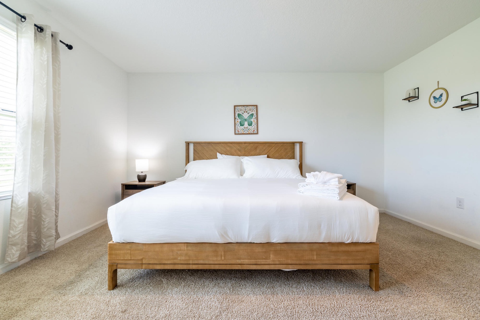 Slip into crisp, freshly pressed linens in your serene bedroom. Bright natural light and simple décor invite peaceful mornings and deep, restful sleep.