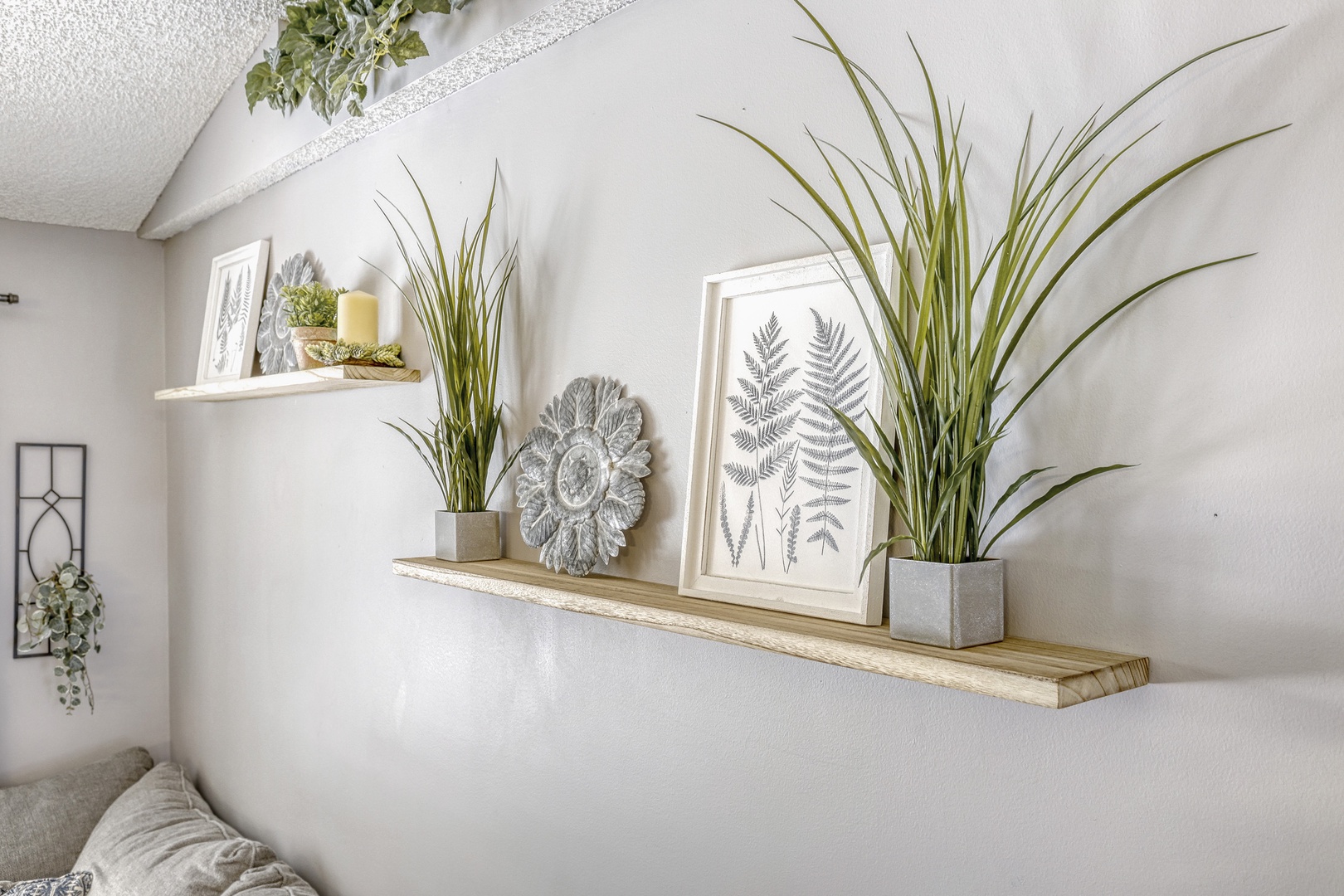 Cozy floating shelves with lush greenery.