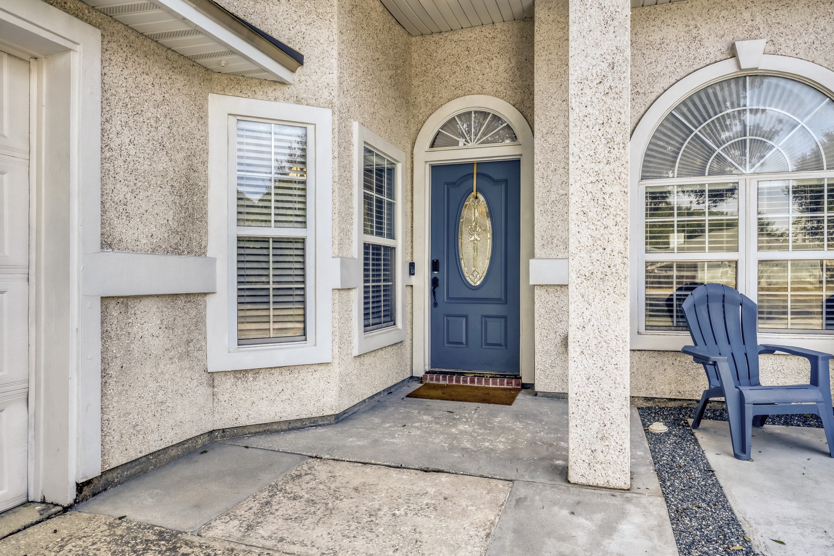 Welcoming single-story pool home entrance