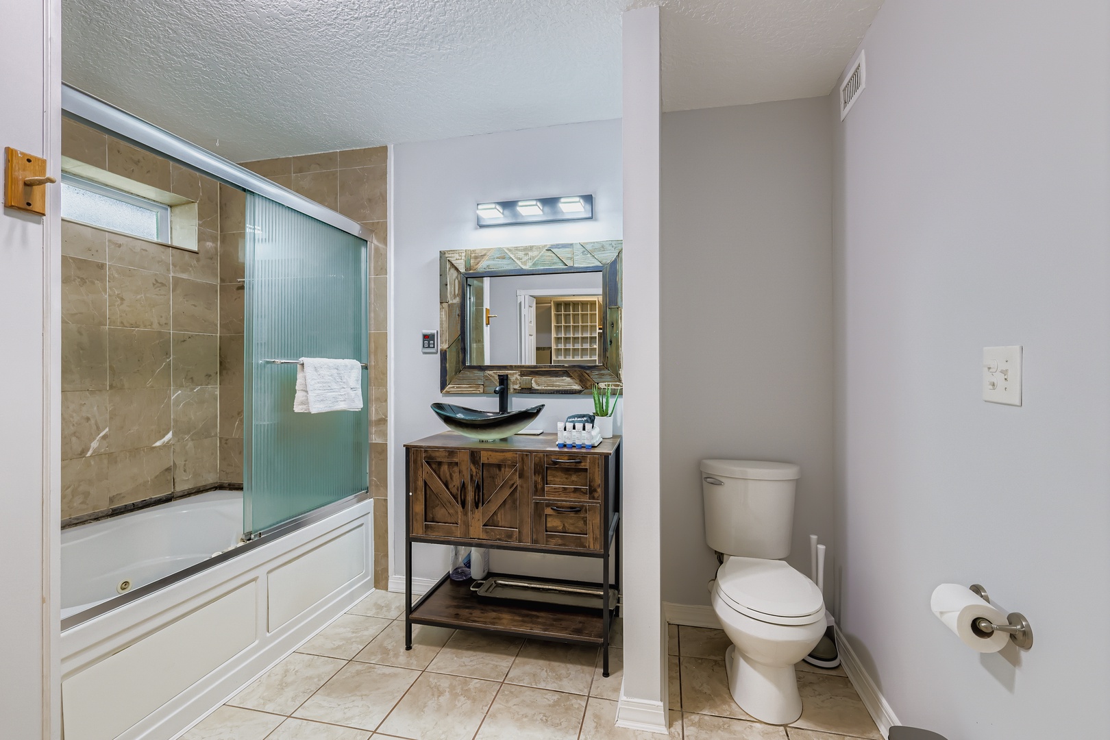 Spacious bathroom, relaxing soak awaits