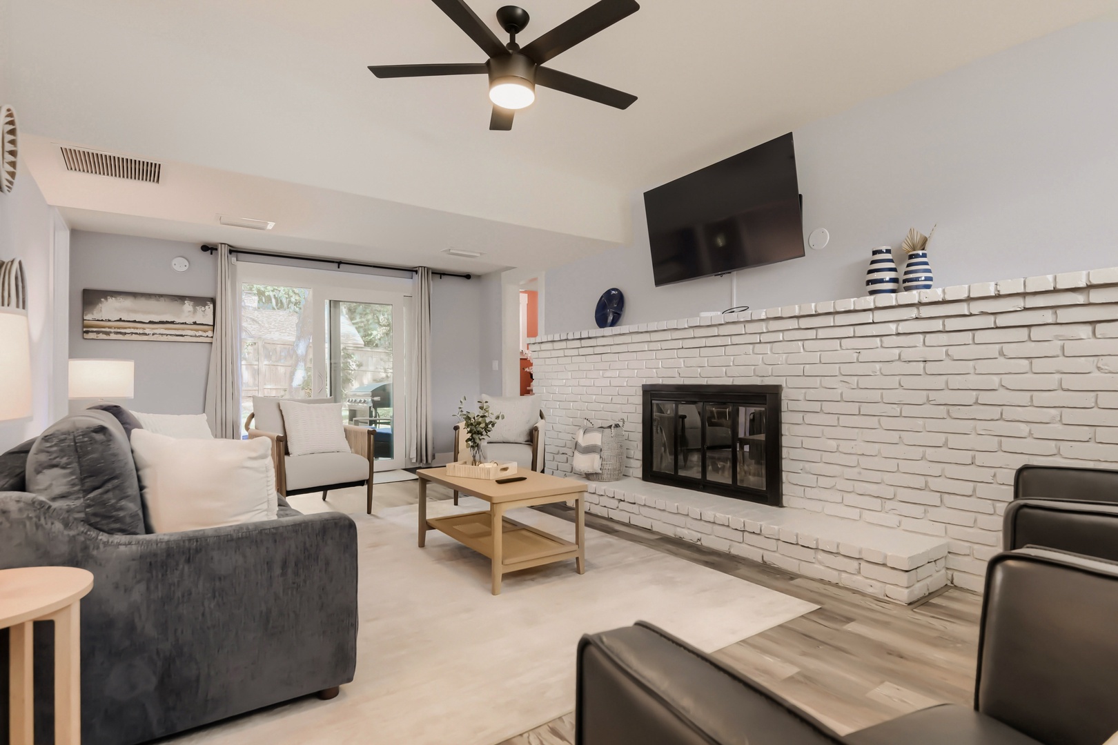 Cozy Living Room with Brick Fireplace