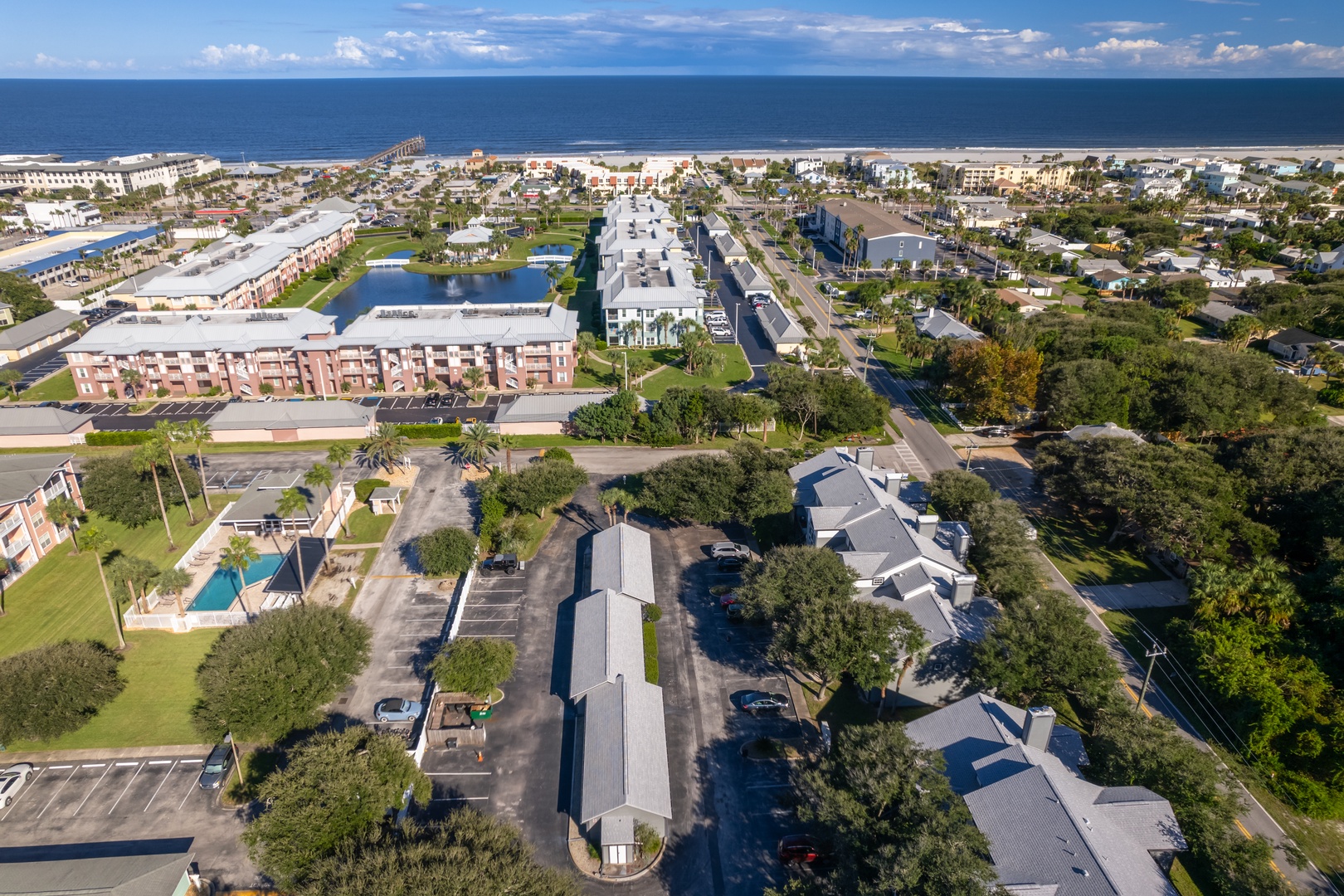 Aerial view over the neighborhood toward the Atlantic Ocean and pier