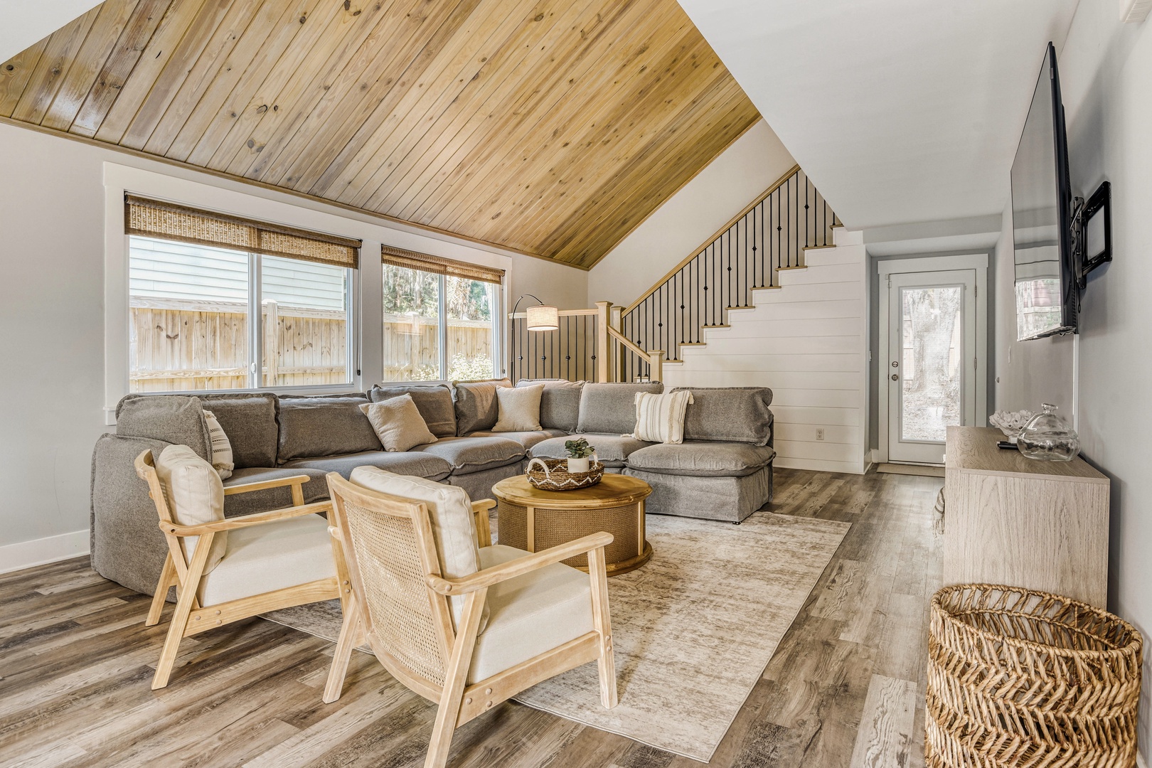Cozy Living Room with Vaulted Wood Ceilings