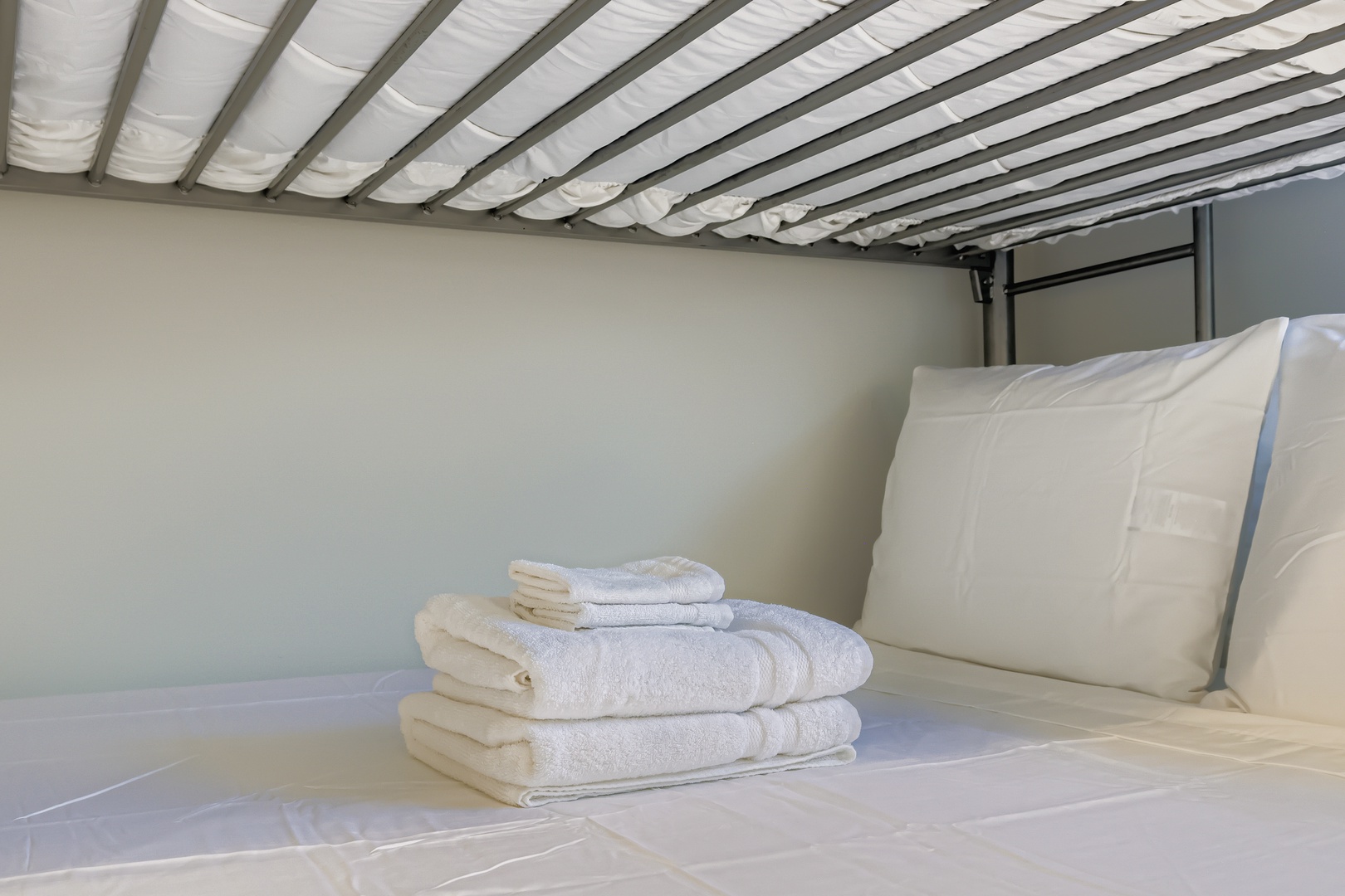 Fresh towels on your cozy bunk bed.