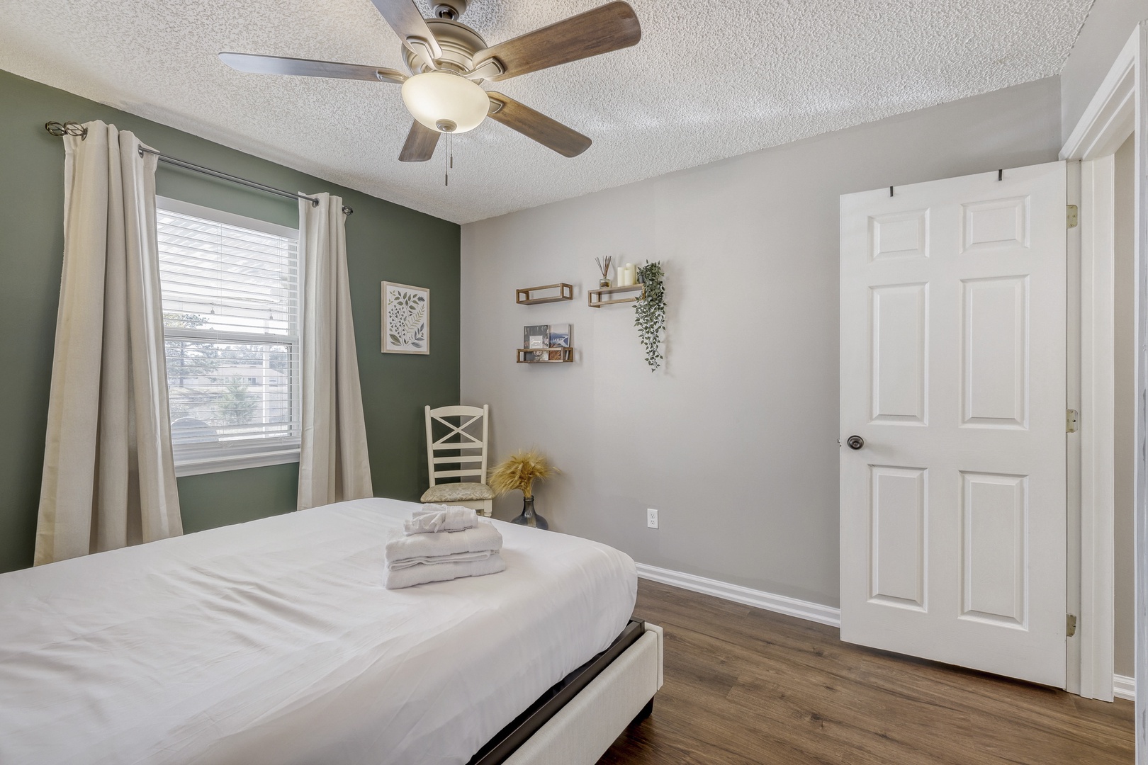 Charming bedroom green accent & farmhouse touches