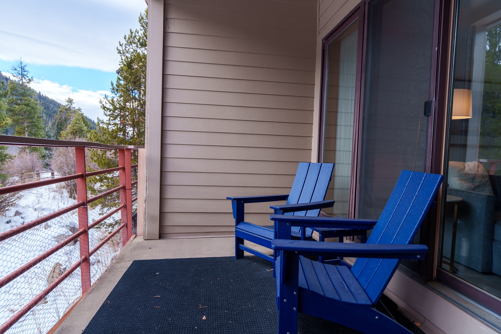 Unwind in your private balcony chairs while soaking up stunning mountain views and fresh alpine air.