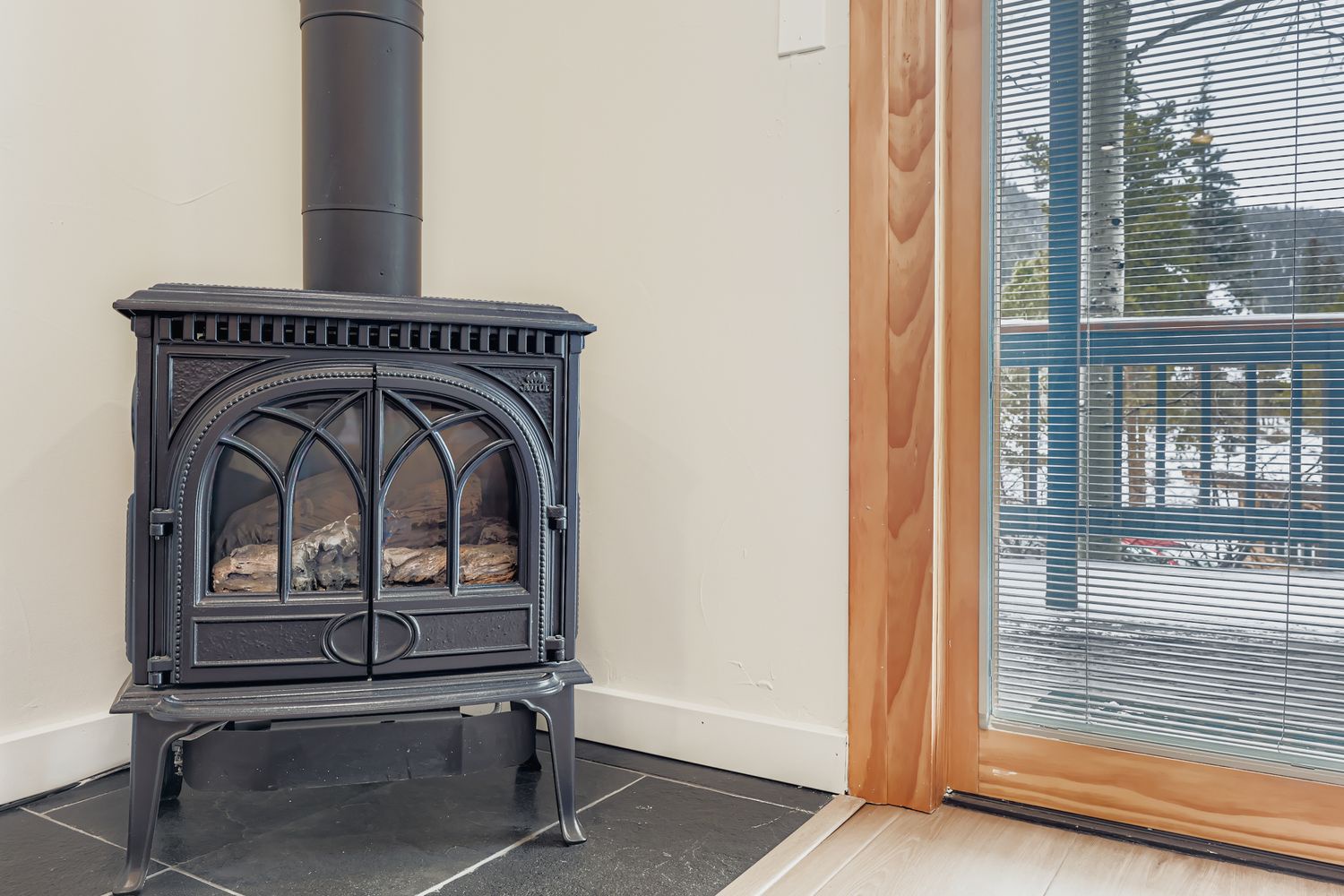 Cozy up by your elegant cast iron fireplace, perfect for creating a warm atmosphere during your stay.