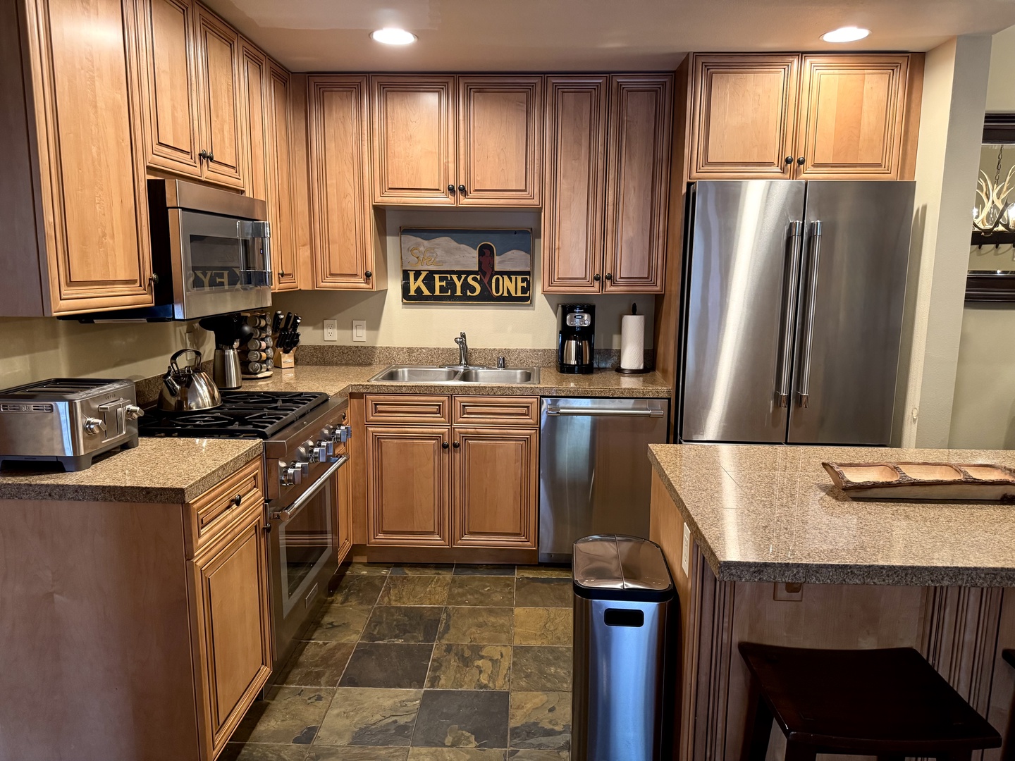 Your spacious kitchen is fully equipped for memorable meals—gleaming stainless appliances, granite counters, and all the cookware you need to feel right at home.