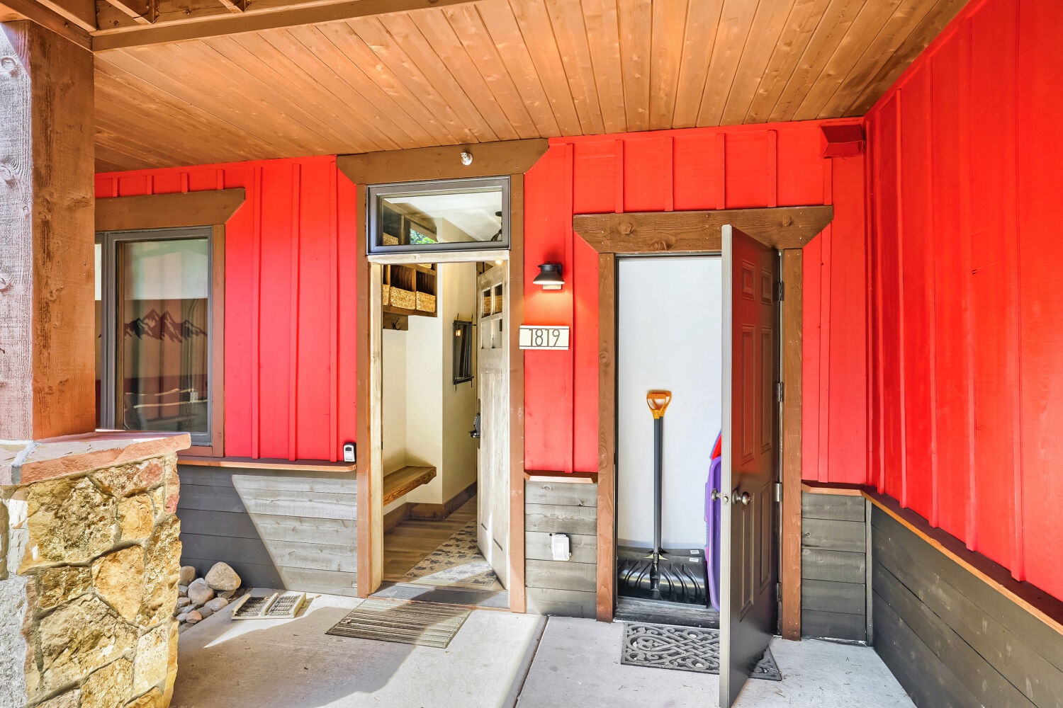 Unit 1819 marks your mountain home with bold color against warm wood. Beyond this door, your alpine retreat awaits—a place where you can truly unwind.