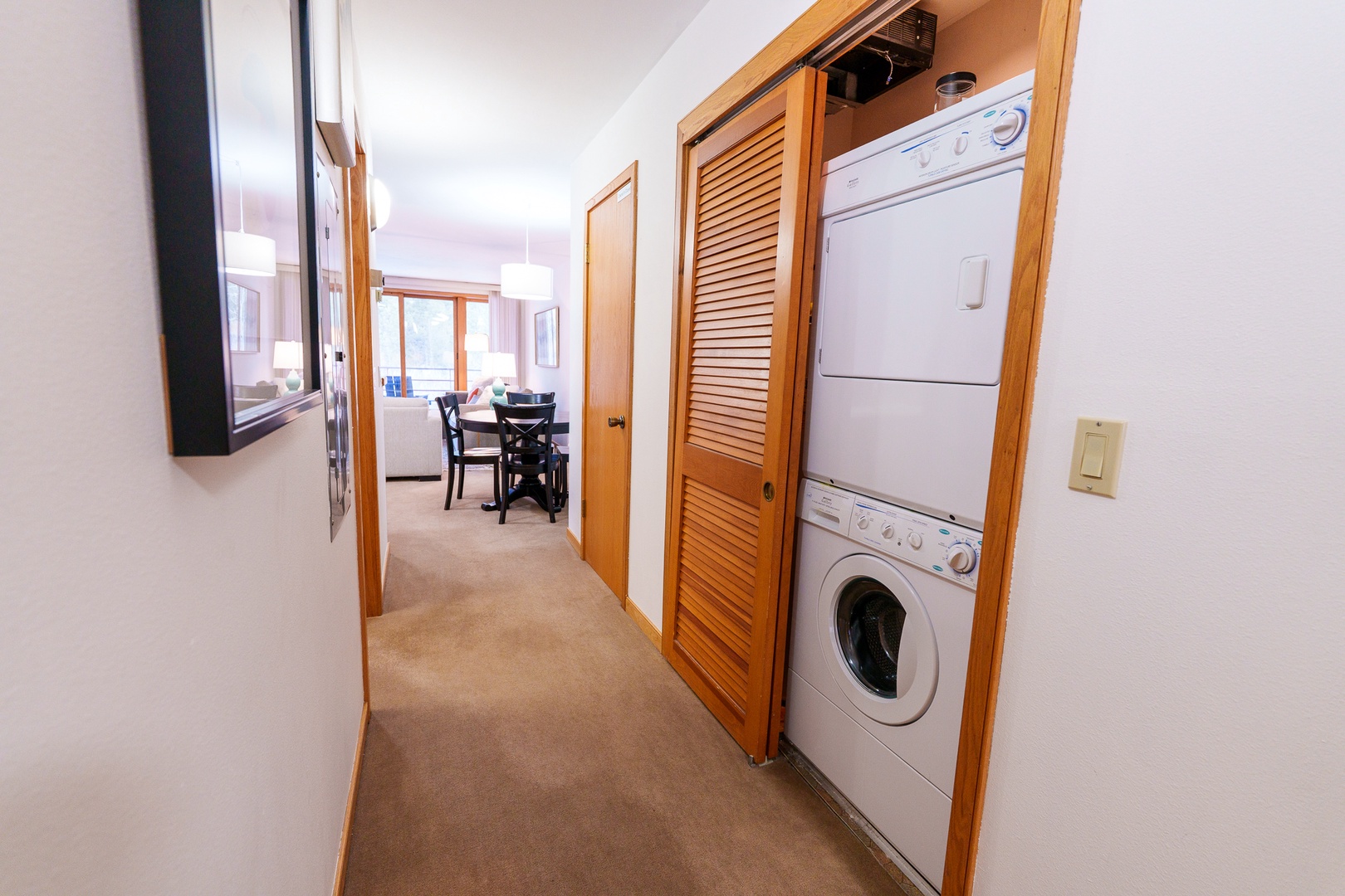 Your in-unit laundry makes life easy—full-size washer and dryer tucked away in your hallway for ultimate convenience.