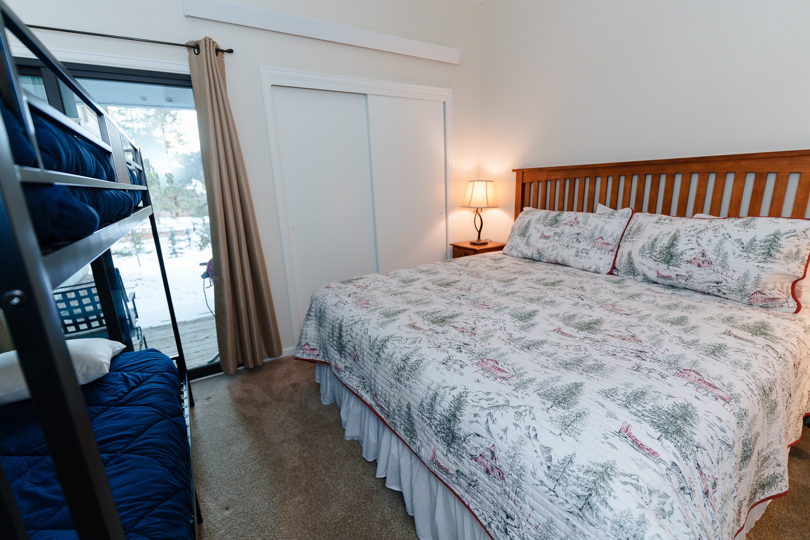 Your comfortable bedroom features a cozy double bed and convenient bunk bed, perfect for families or groups looking to share memorable moments together.