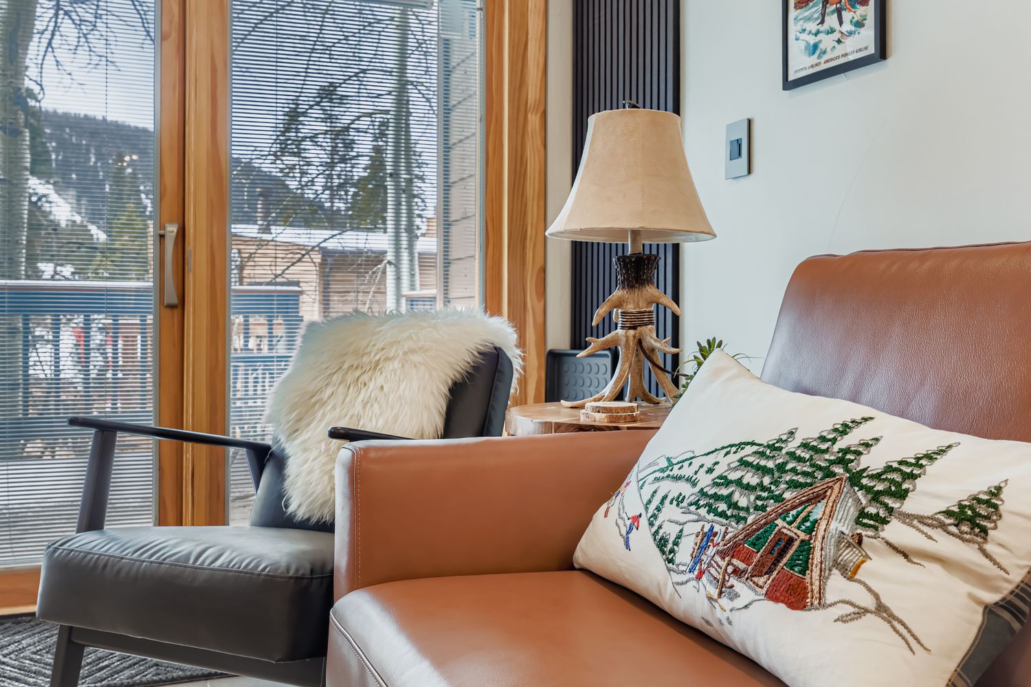 Sink into comfort on this plush leather sofa where you can unwind with a book or simply enjoy the peaceful moments of your mountain getaway.