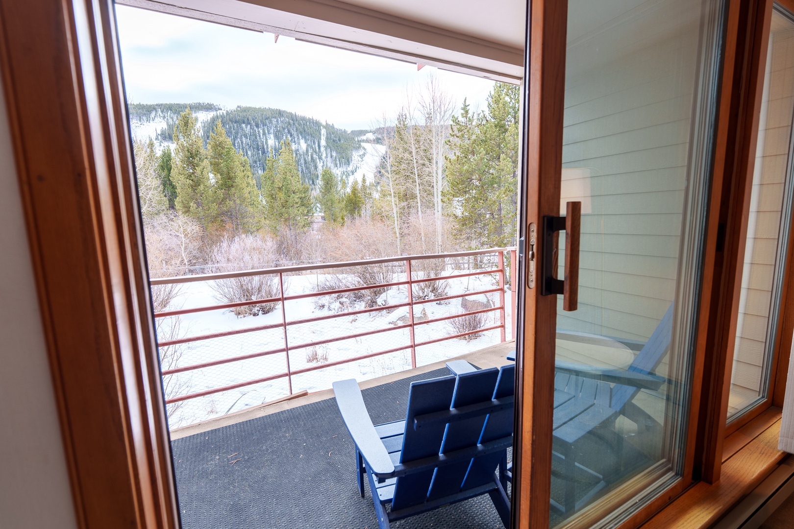Step onto your private balcony and soak in breathtaking mountain views. Two comfortable chairs await for morning coffee or evening relaxation.