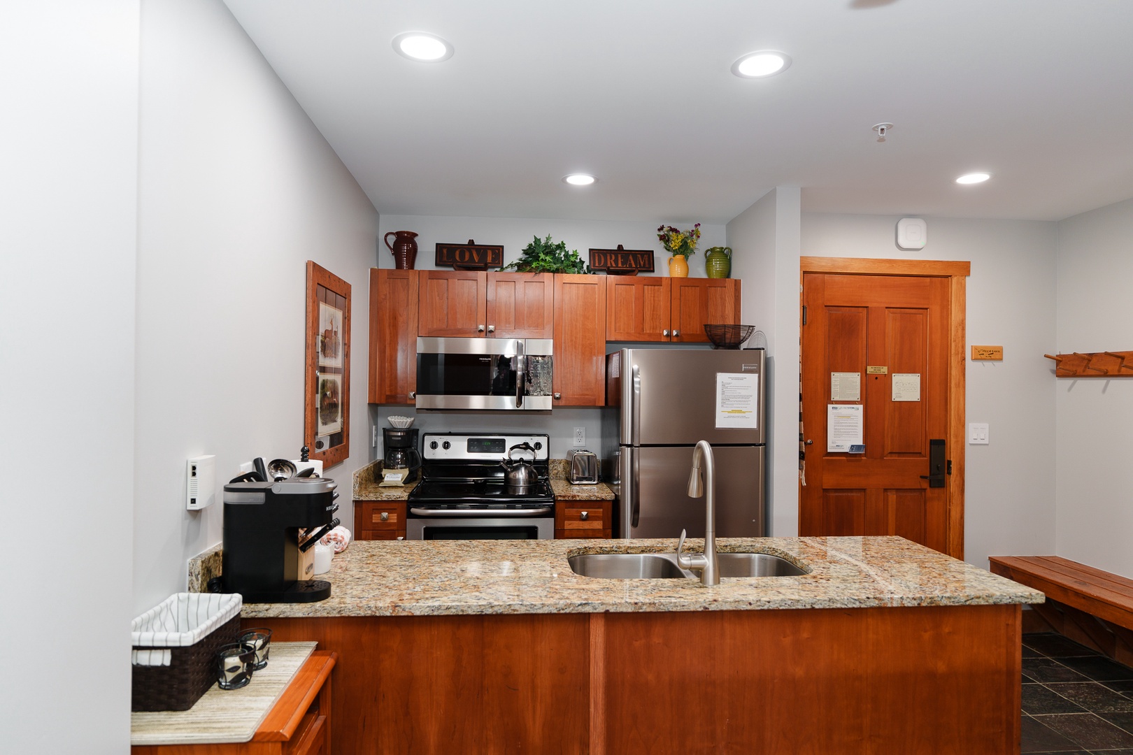 Your fully equipped kitchen features granite countertops, stainless steel appliances, and everything you need to prepare meals during your stay.