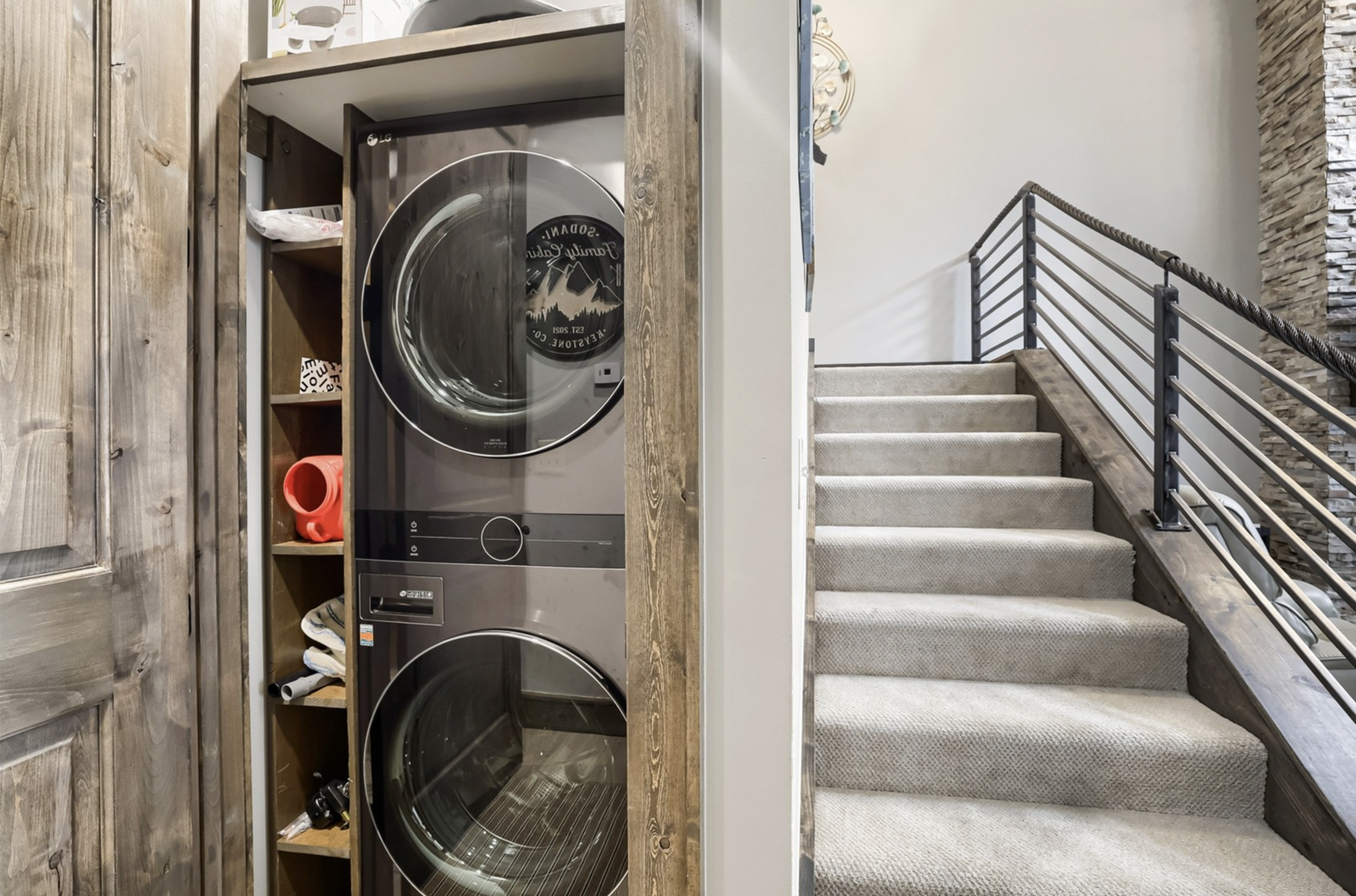 Laundry is one less thing to worry about on your getaway—your fully stacked washer and dryer are tucked neatly into a closet, ready when you need them.