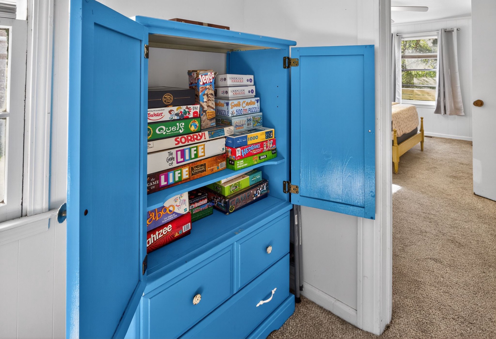 Living Room - Fully Stocked Game Cabinet