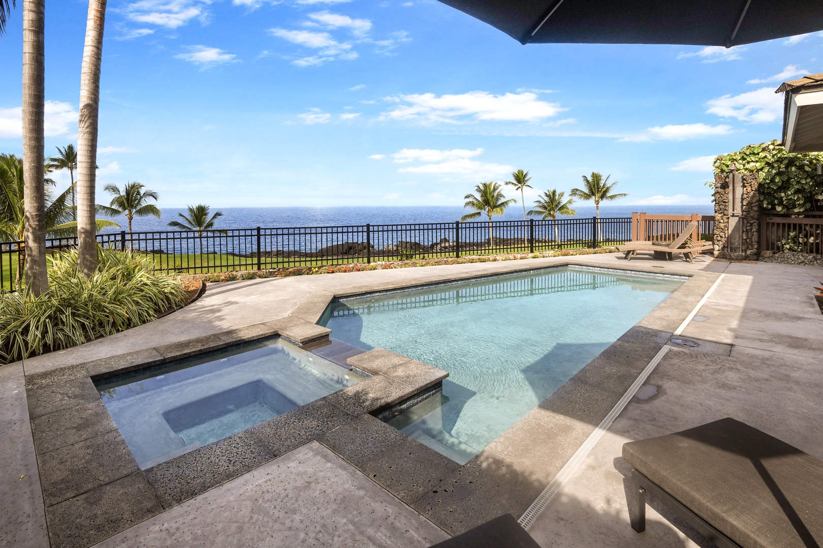 Your private oasis awaits with sparkling pool and endless ocean views stretching to the horizon.